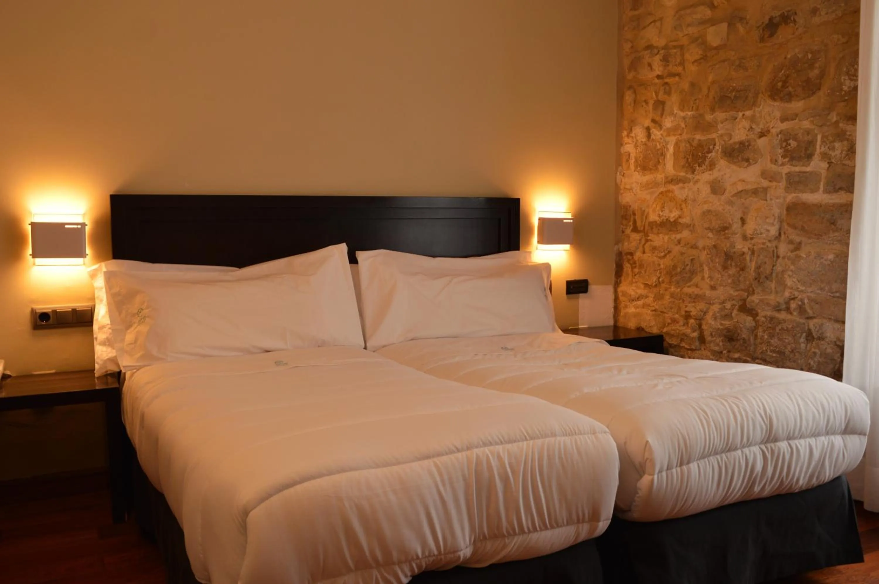 Bed in Hotel Baeza Monumental by eme hoteles