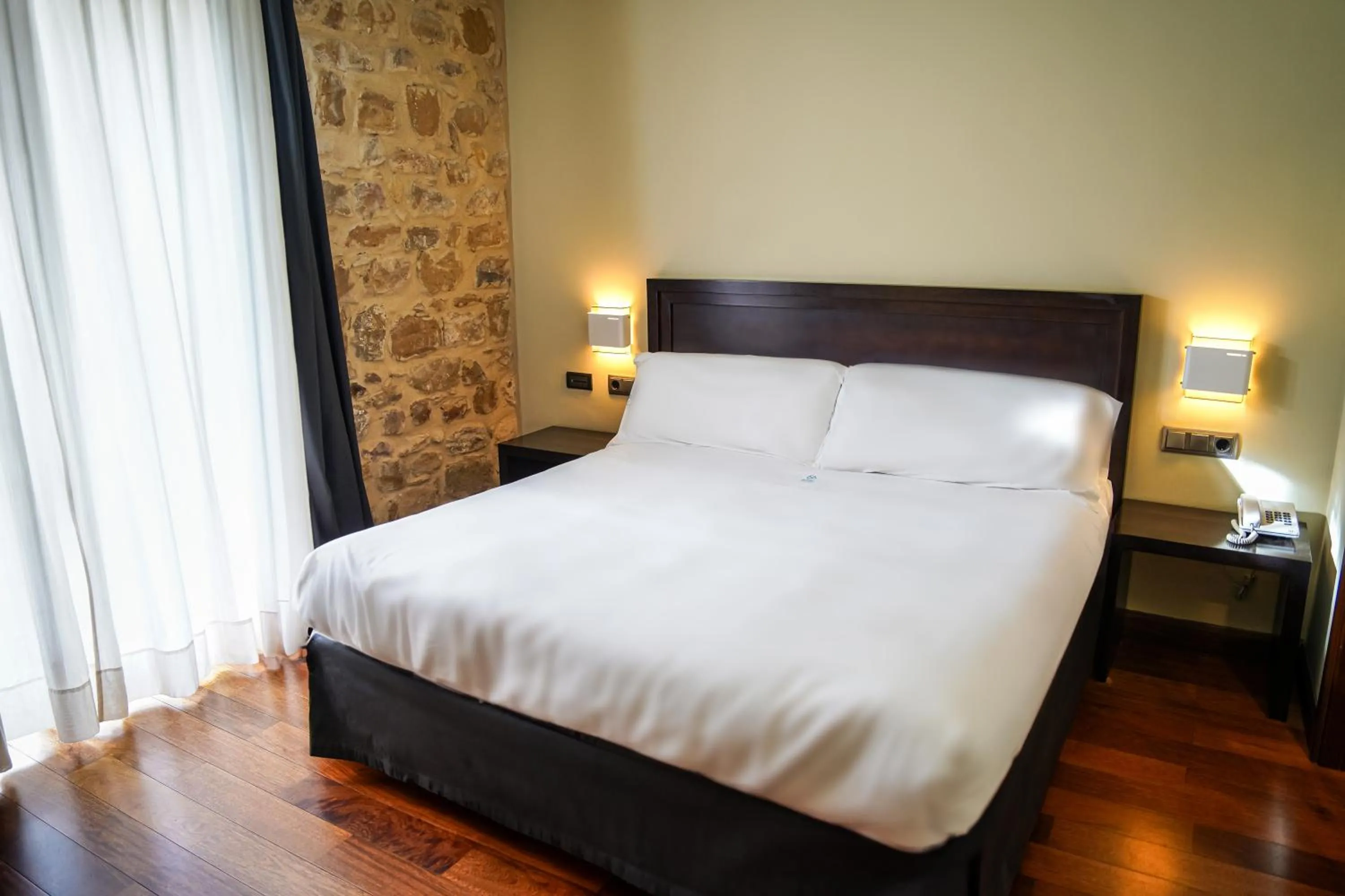 Bed in Hotel Baeza Monumental by eme hoteles