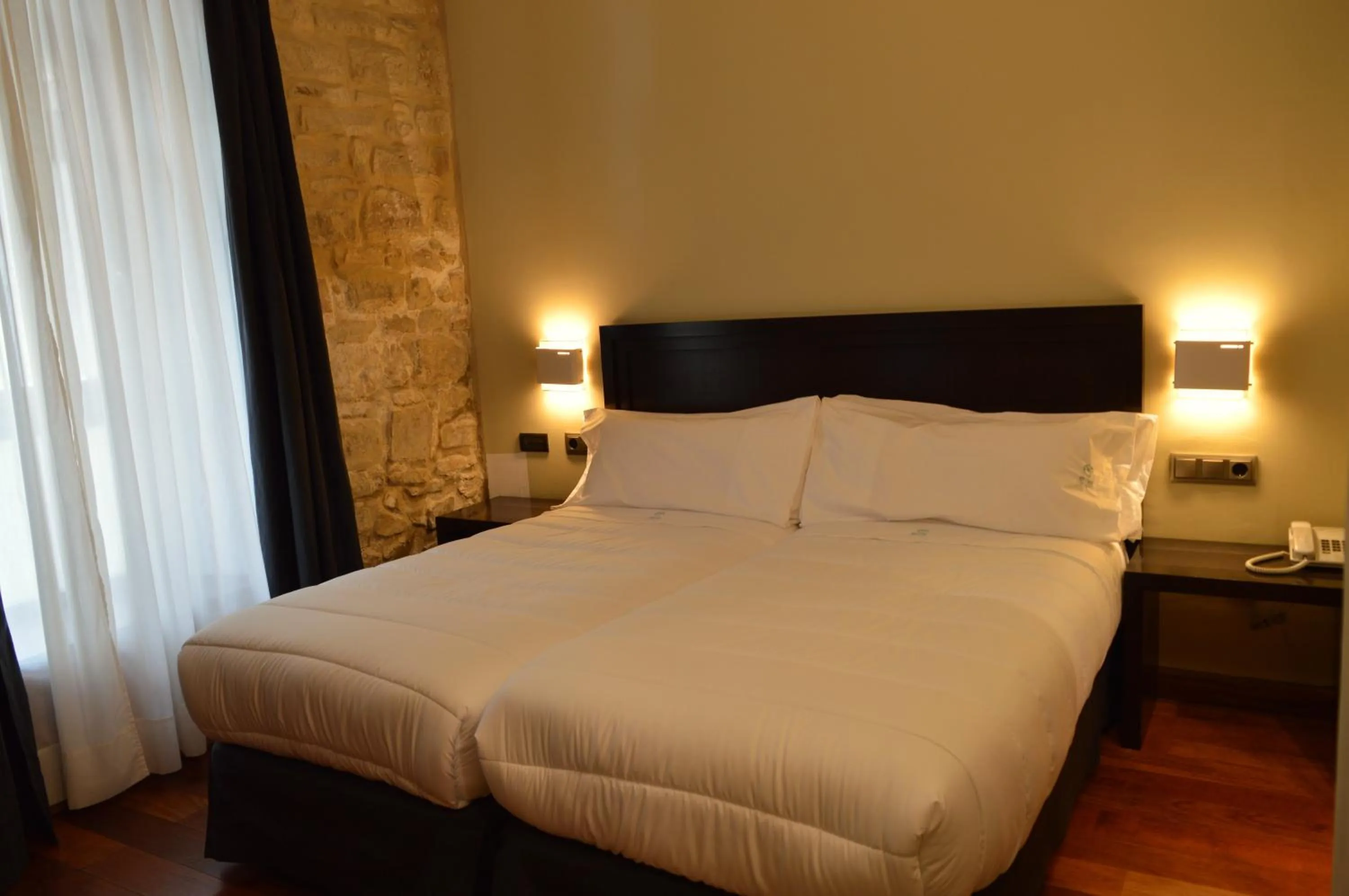 Bed in Hotel Baeza Monumental by eme hoteles