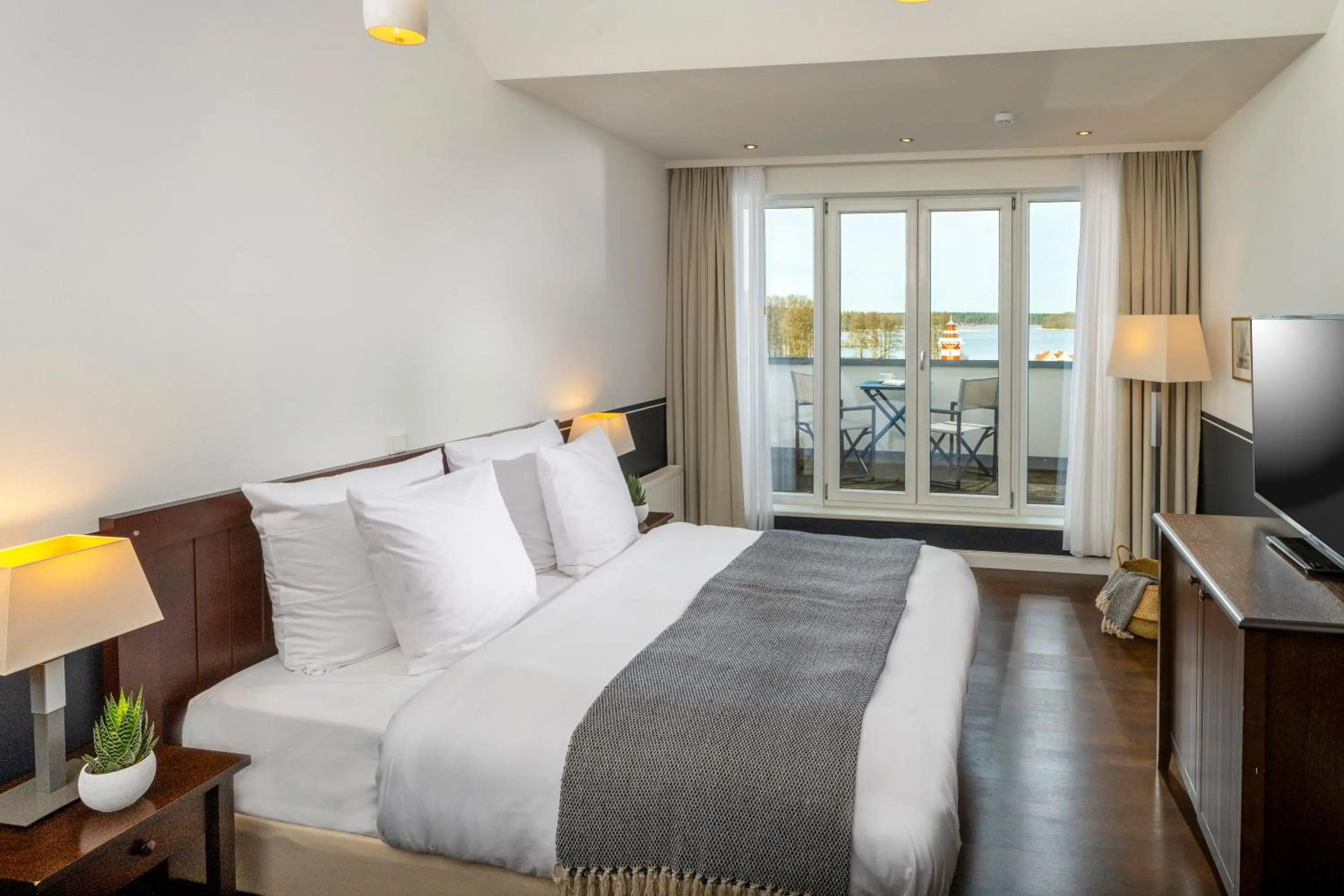 Photo of the whole room, Bed in Precise Resort Hafendorf Rheinsberg