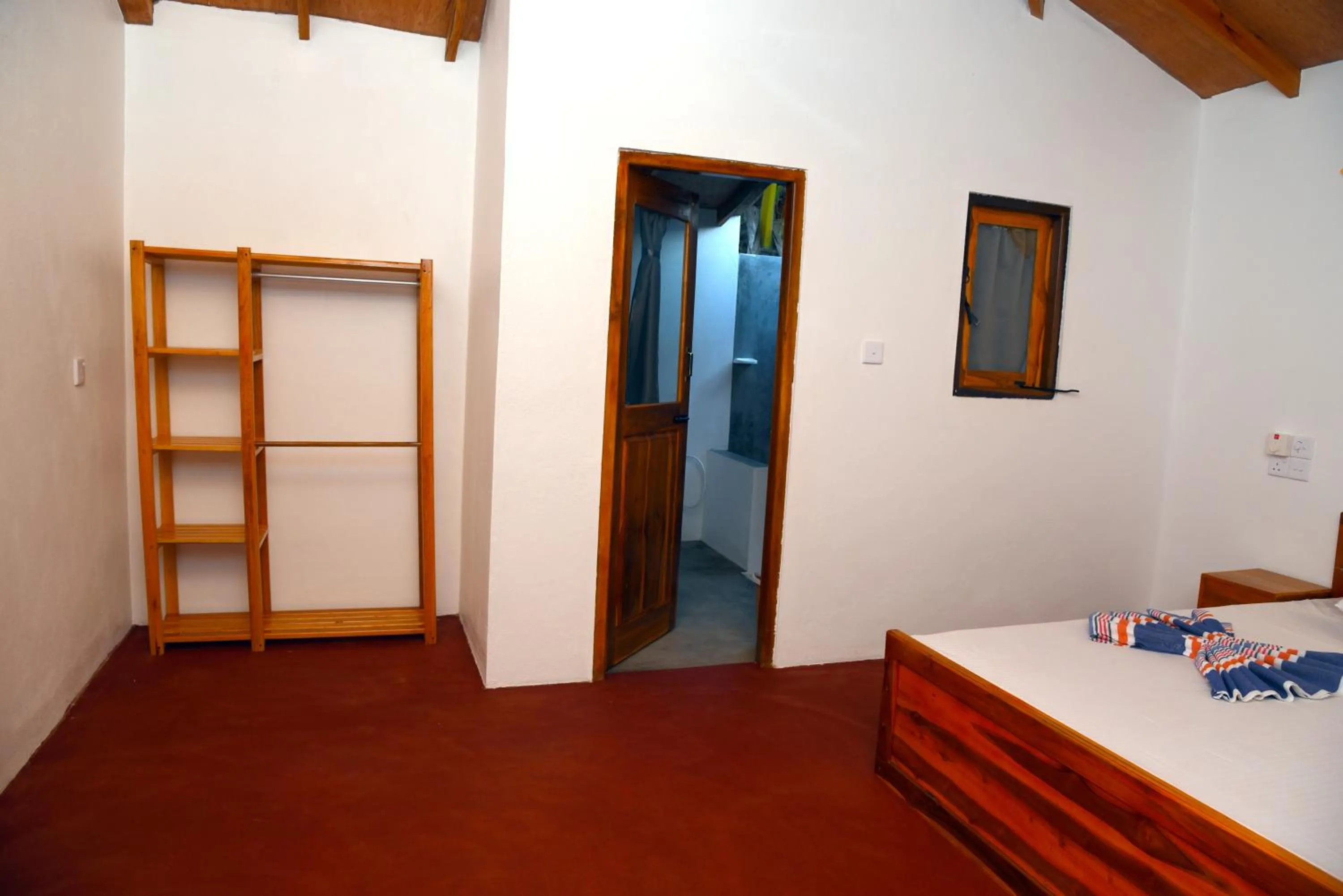 Photo of the whole room, Bed in Prime Surfers Bungalow