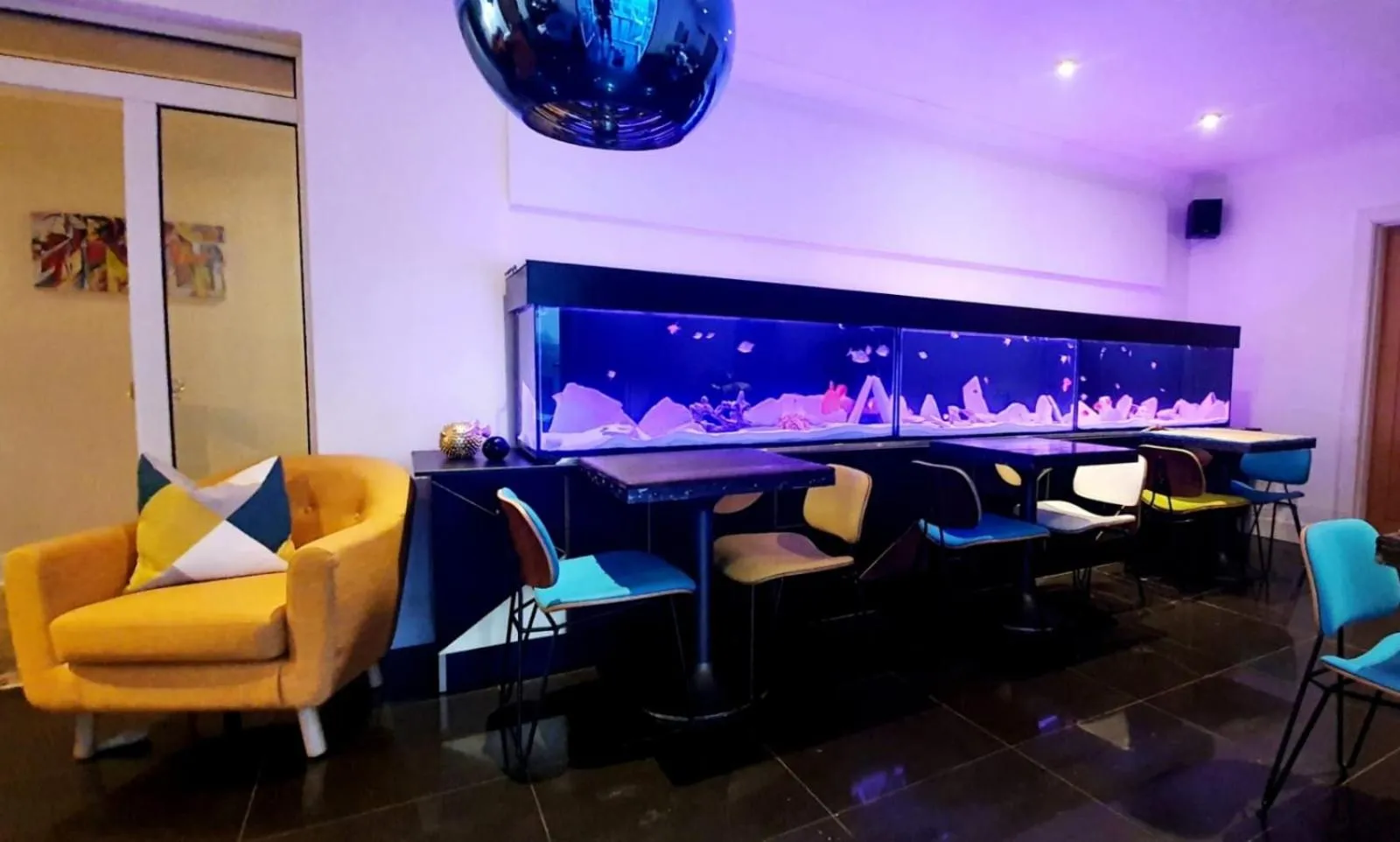 Seating area in The Orange Fox Lux Room and Hot Tub at The Grumpy Schnauzer Guest House