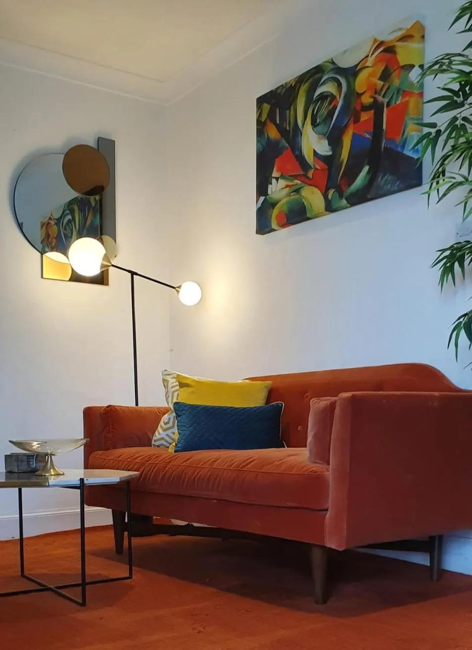Seating area in The Orange Fox Lux Room and Hot Tub at The Grumpy Schnauzer Guest House