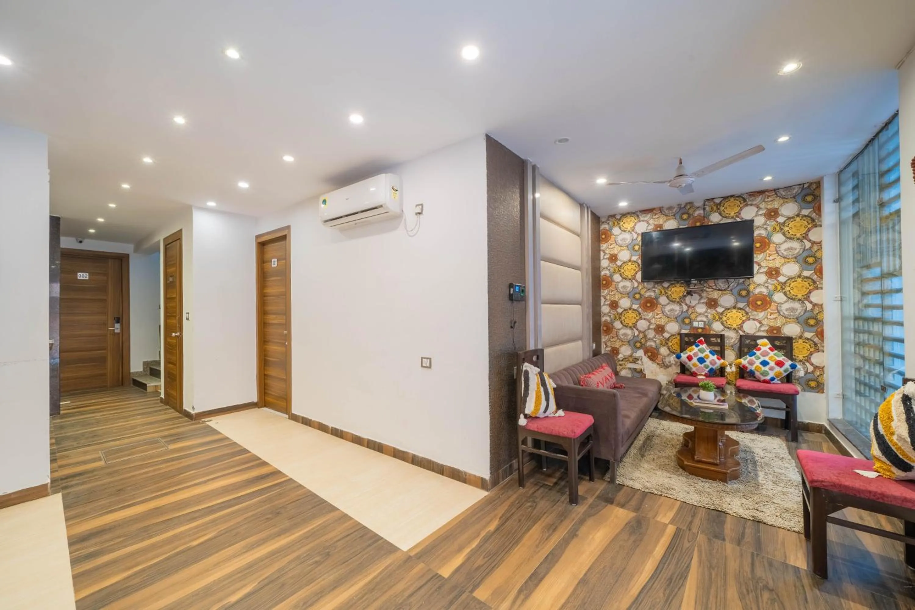 Communal lounge/ TV room in Perfectstayz Premium Ganga Heights - Ganga View rooftop cafe