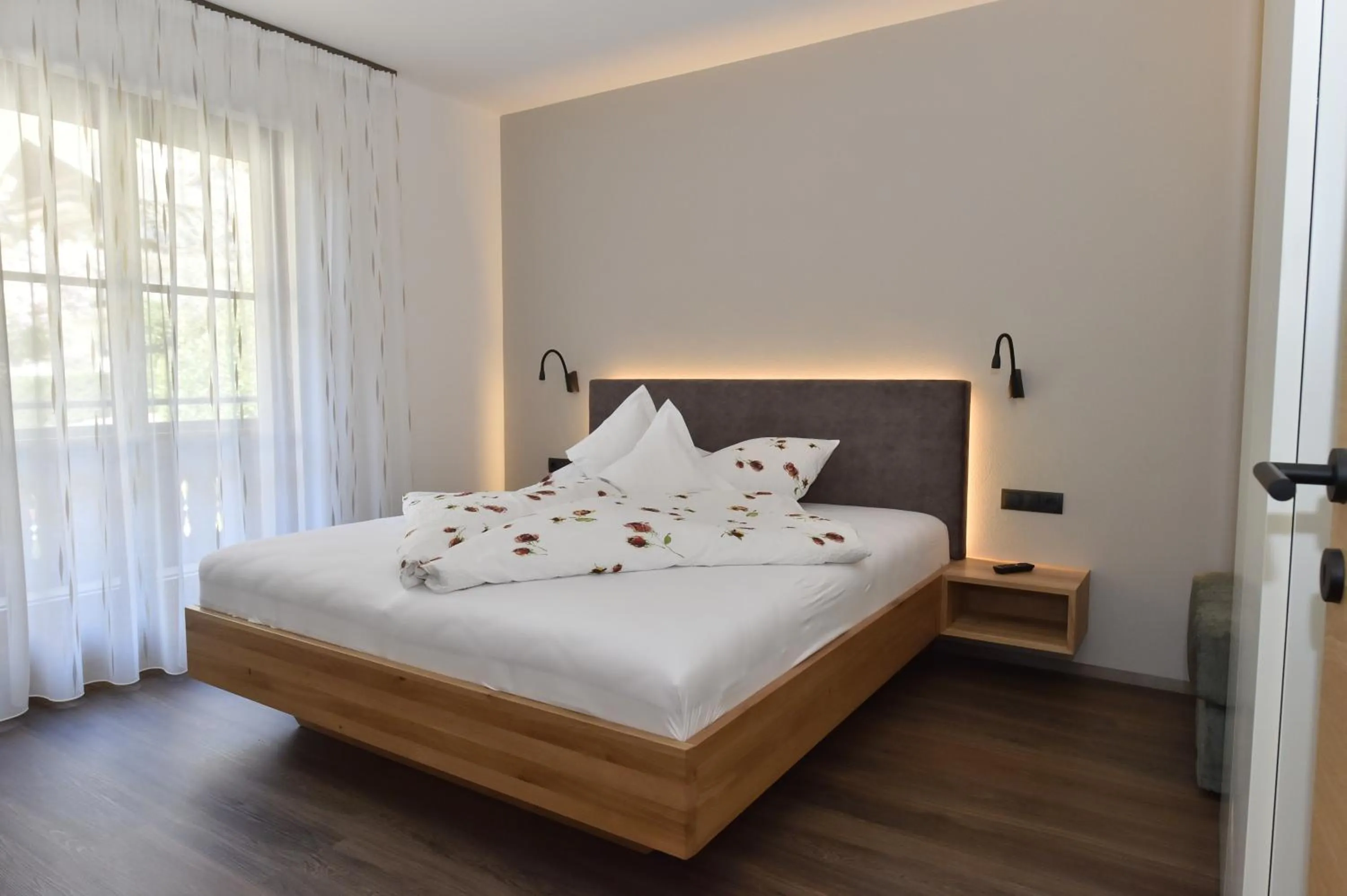 Bed in Appartements Lenzenhof