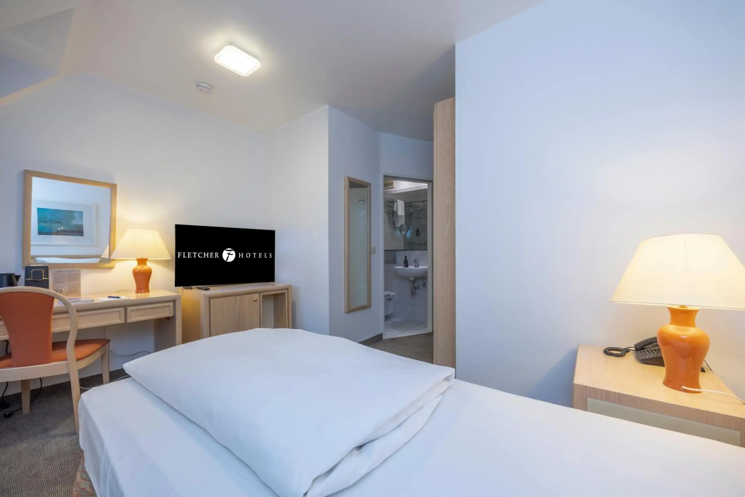 Photo of the whole room, Bed in Fletcher Waldhotel Nordrhein-Westfalen Photo of the whole room, Bed in Fletcher Waldhotel Nordrhein-Westfalen