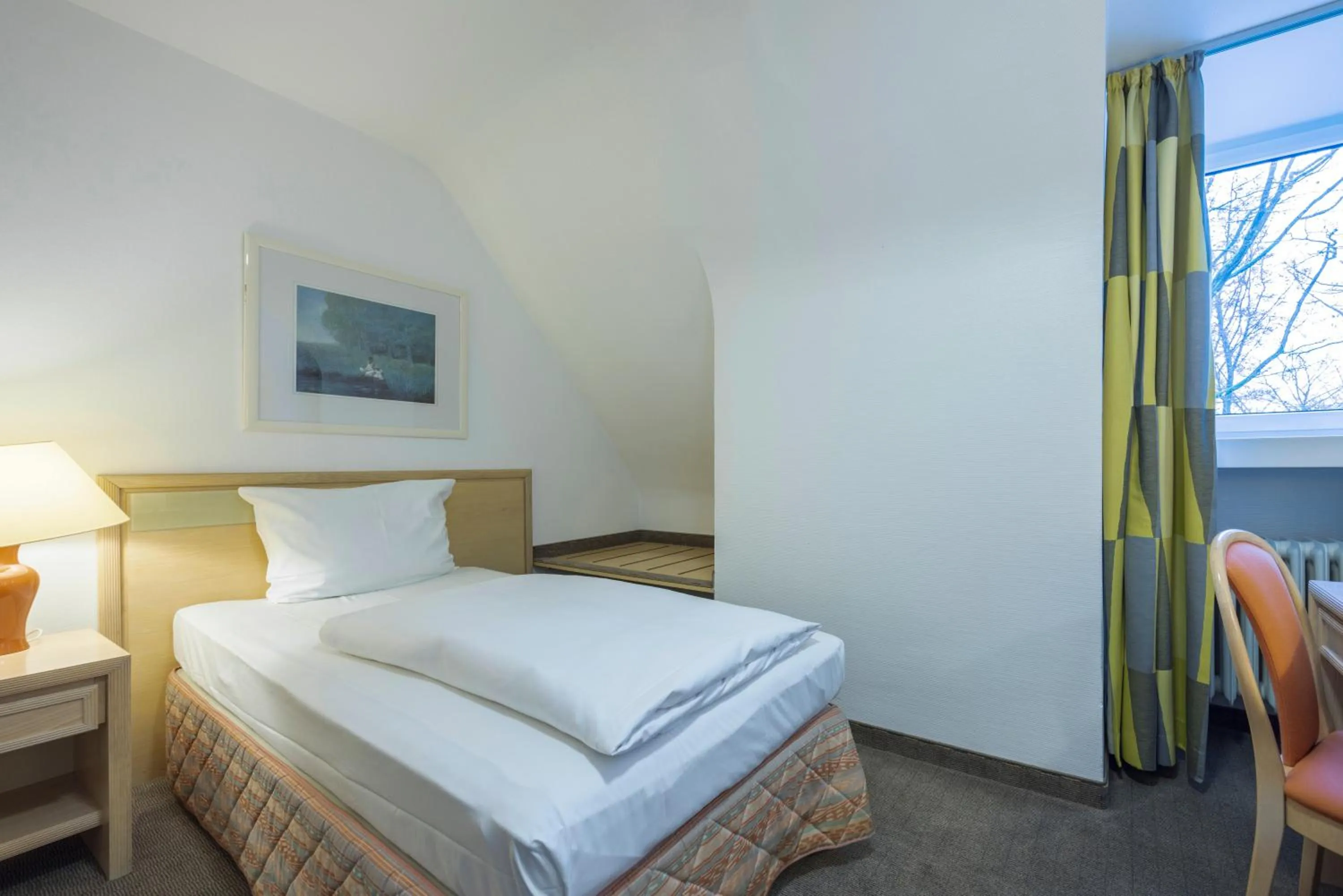 Photo of the whole room, Bed in Fletcher Waldhotel Nordrhein-Westfalen