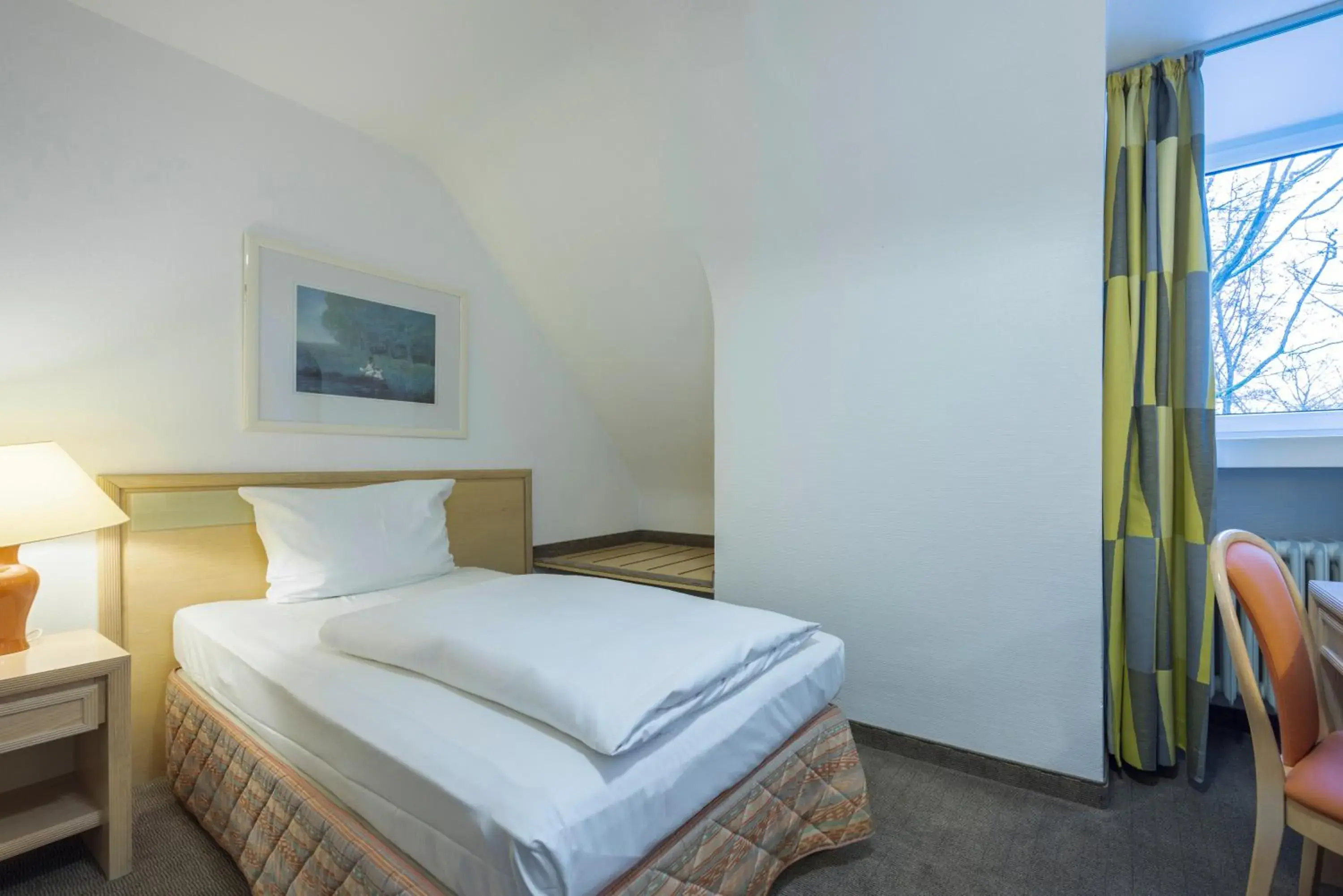 Photo of the whole room, Bed in Fletcher Waldhotel Nordrhein-Westfalen Photo of the whole room, Bed in Fletcher Waldhotel Nordrhein-Westfalen