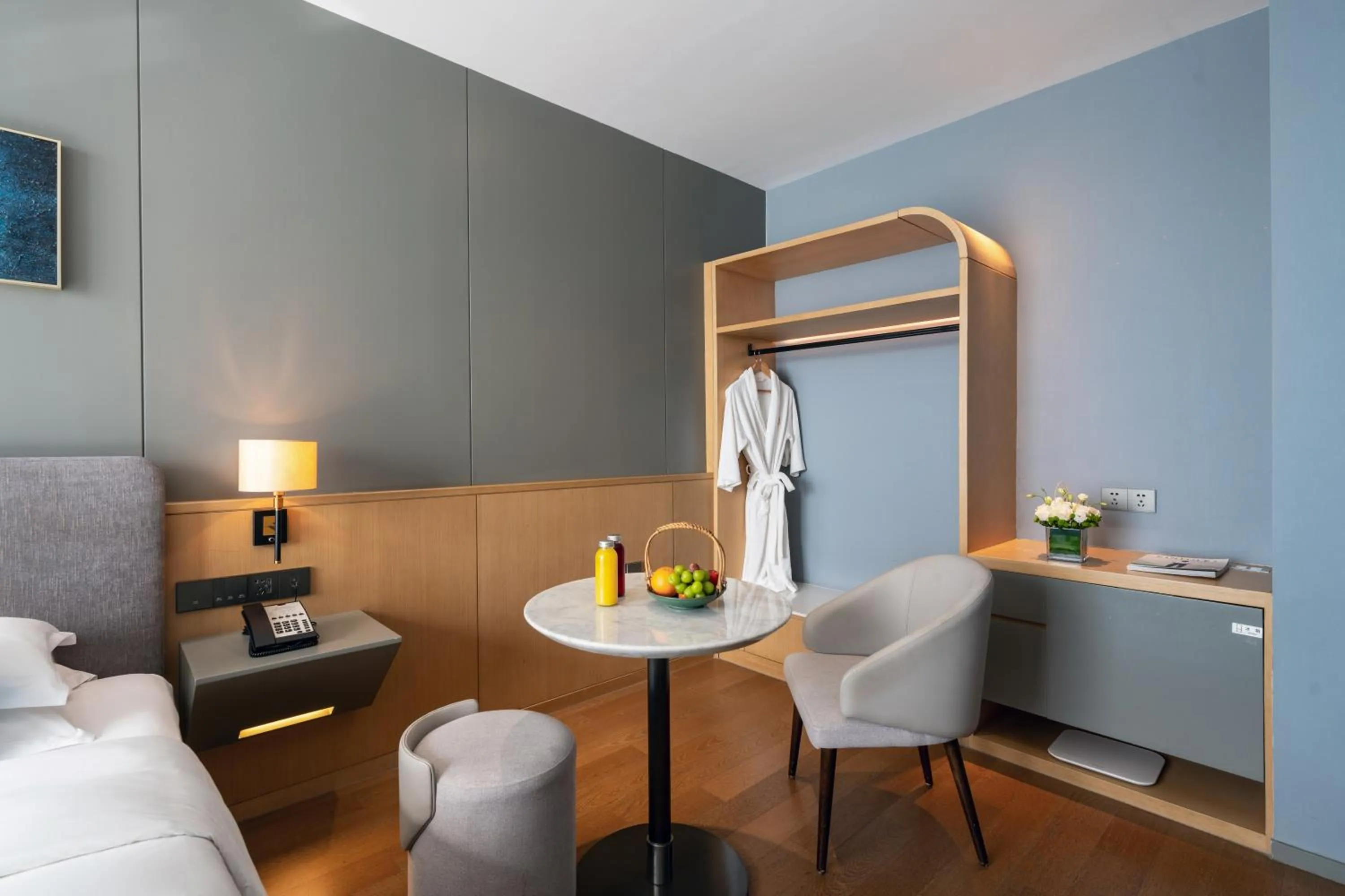 Bed in SSAW Boutique Hotel Wenzhou Dexin