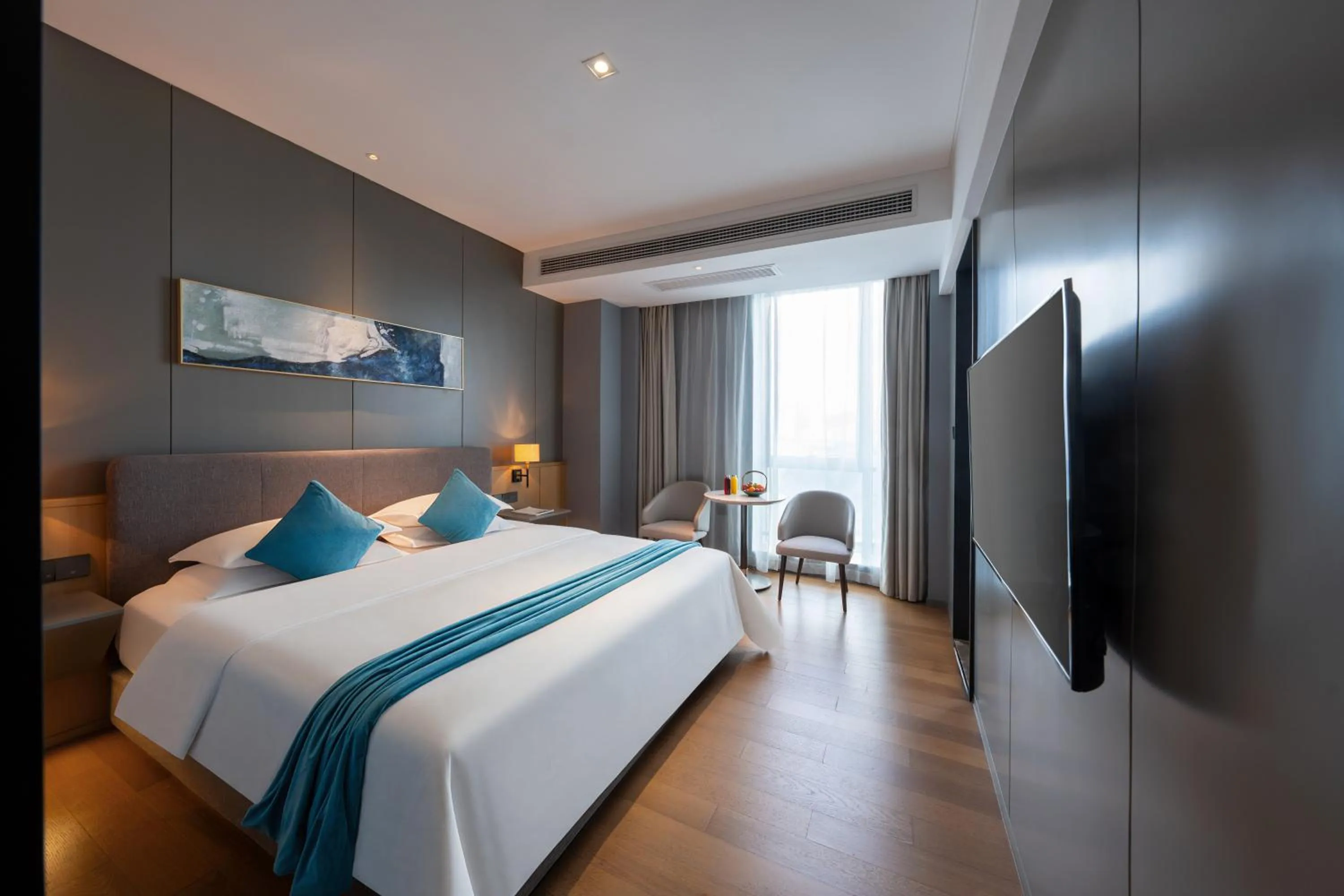 Bed in SSAW Boutique Hotel Wenzhou Dexin