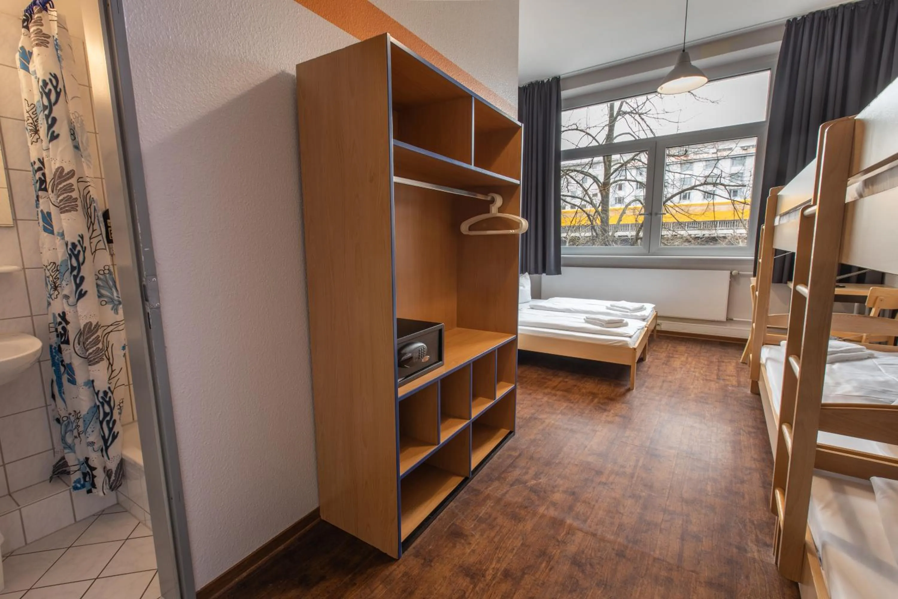 wardrobe, Bed in acama Hotel & Hostel Kreuzberg