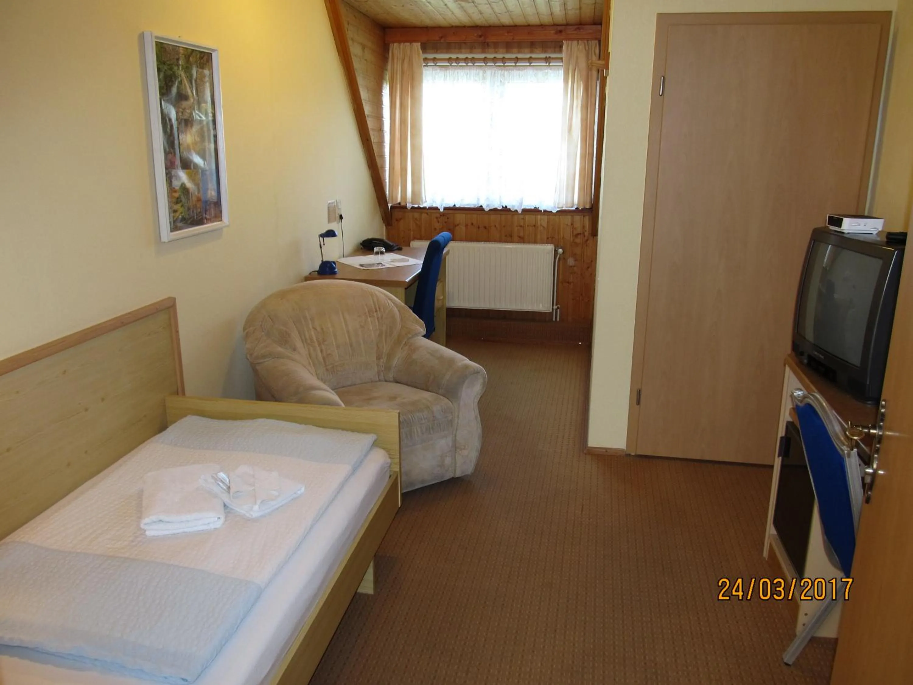 Photo of the whole room, Bed in Hotel Landhaus Nassau