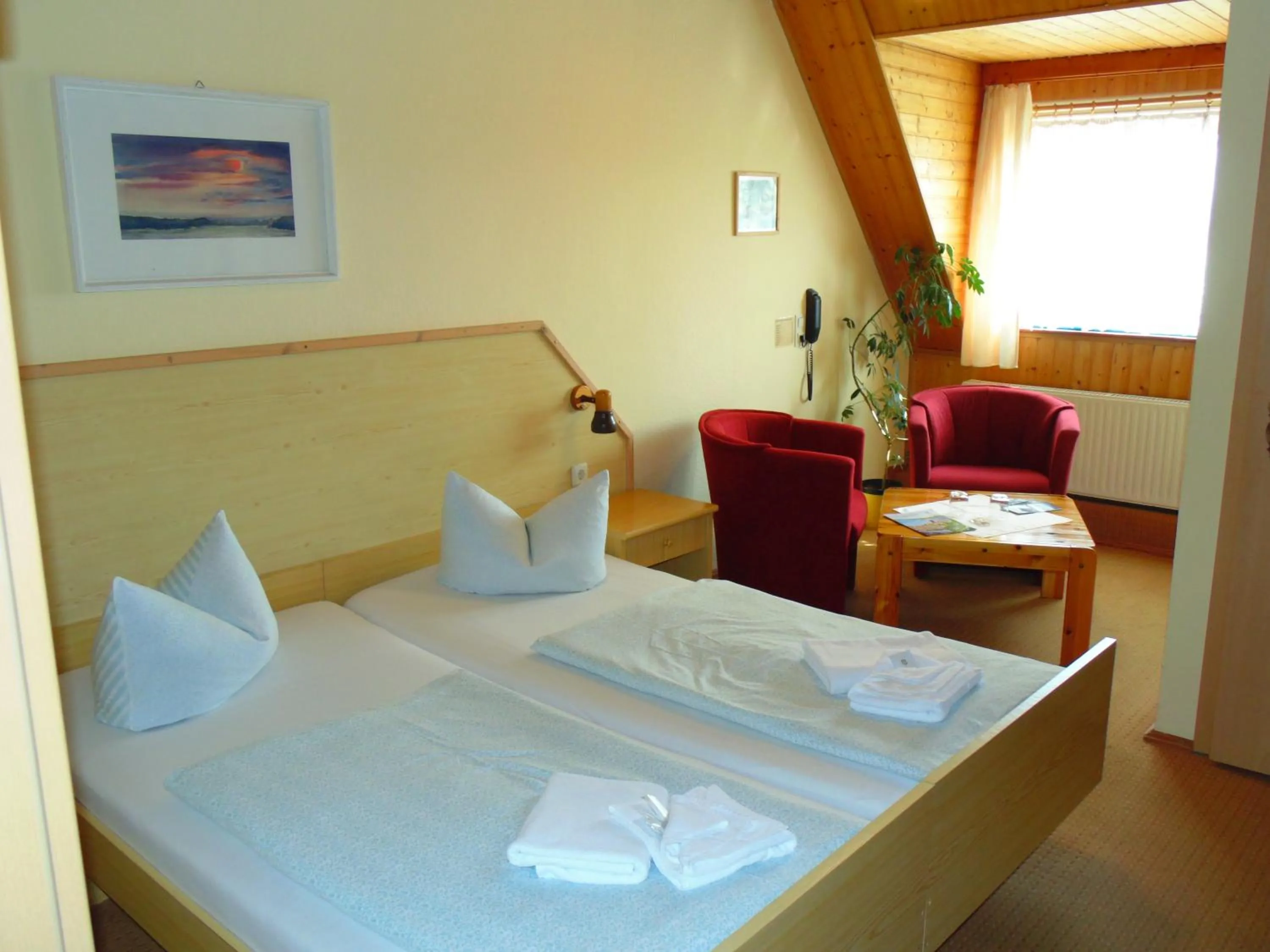 Photo of the whole room, Bed in Hotel Landhaus Nassau