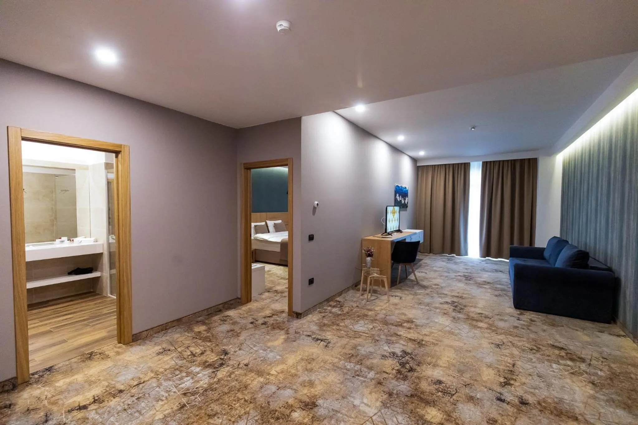 Bed in GRAND VIEW Hotel & Suites Copou