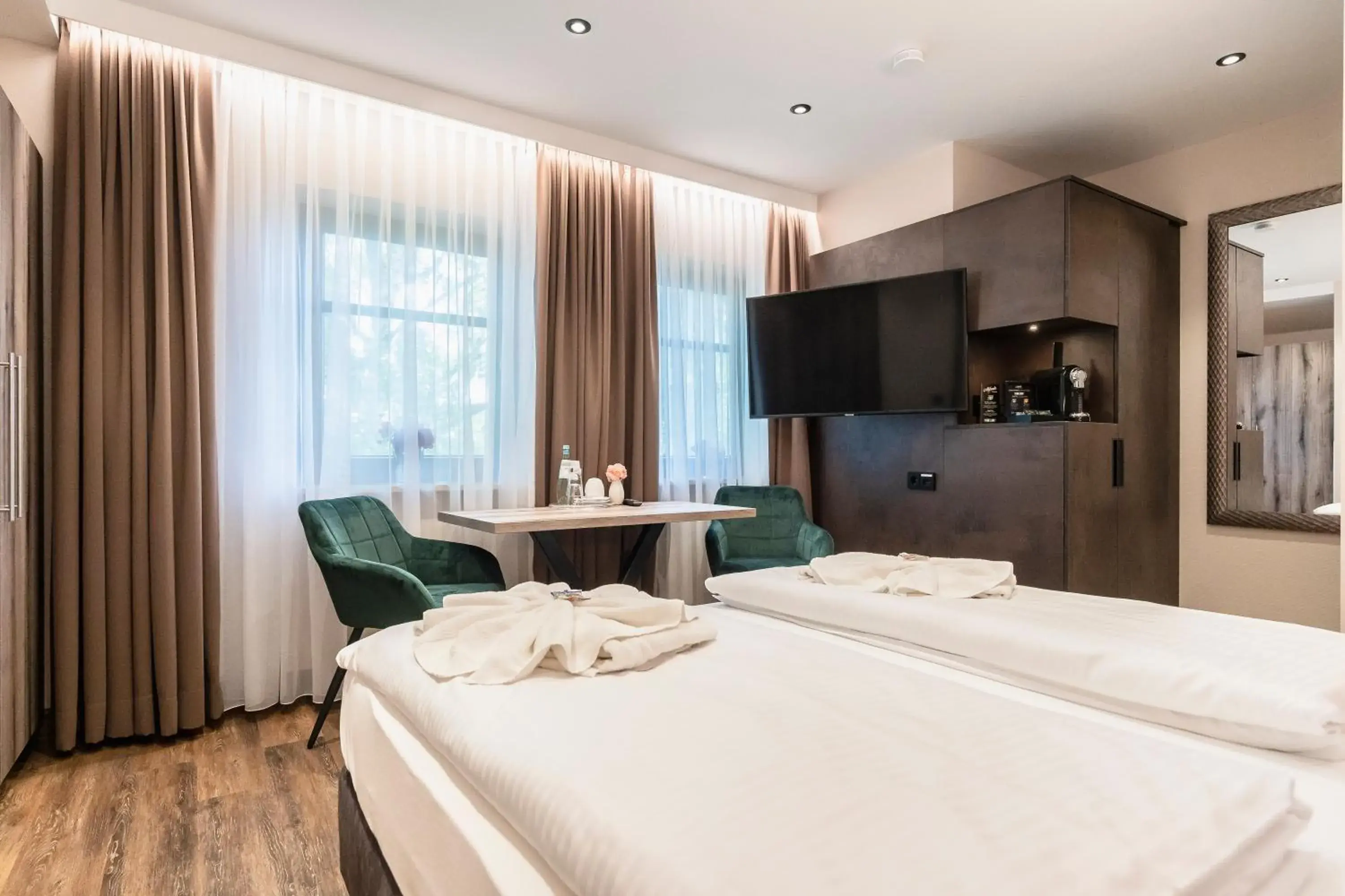 Photo of the whole room, Bed in Hotel Demas München-Unterhaching Photo of the whole room, Bed in Hotel Demas München-Unterhaching
