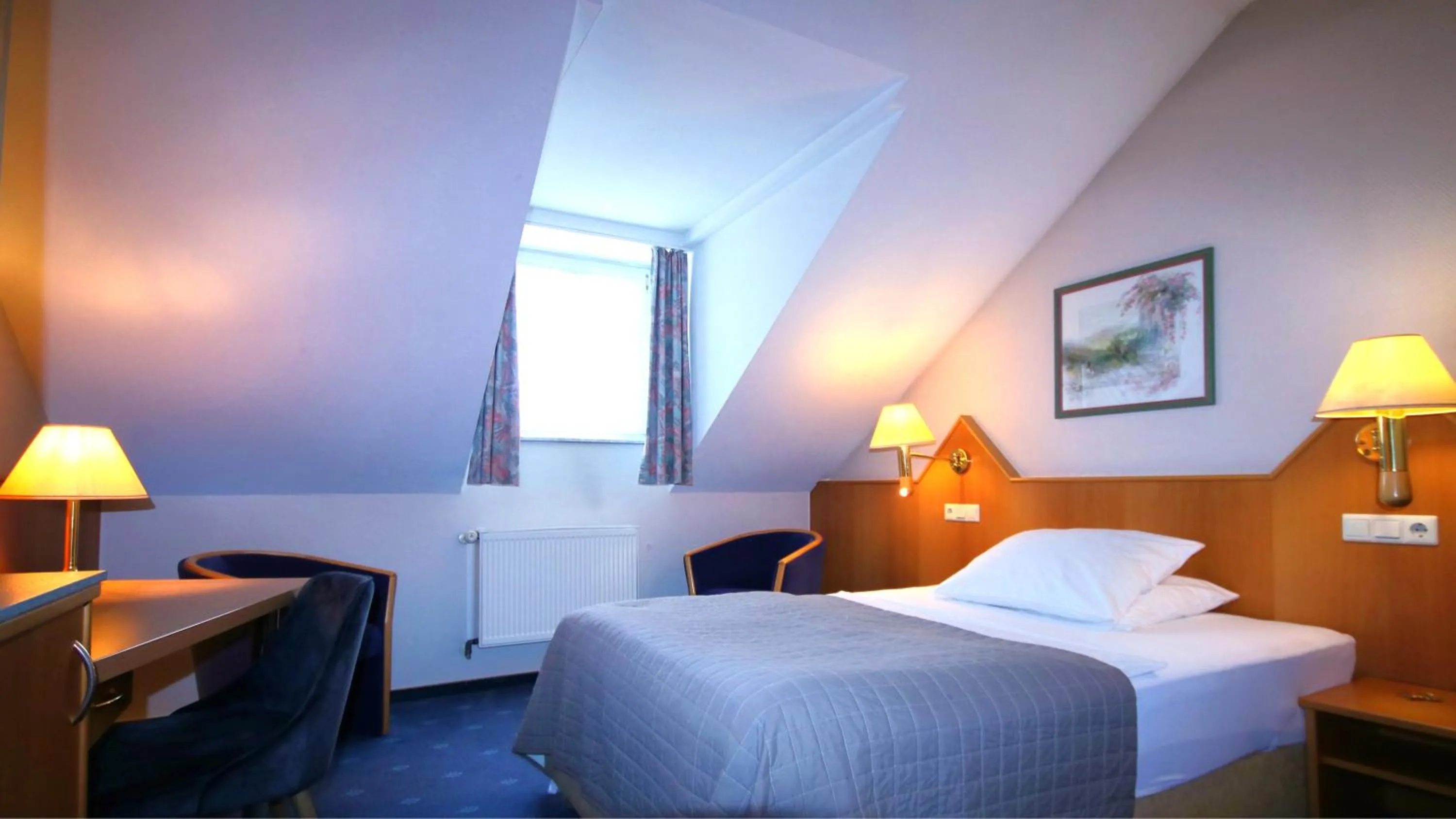 Photo of the whole room, Bed in Komfort Hotel Am Kurpark