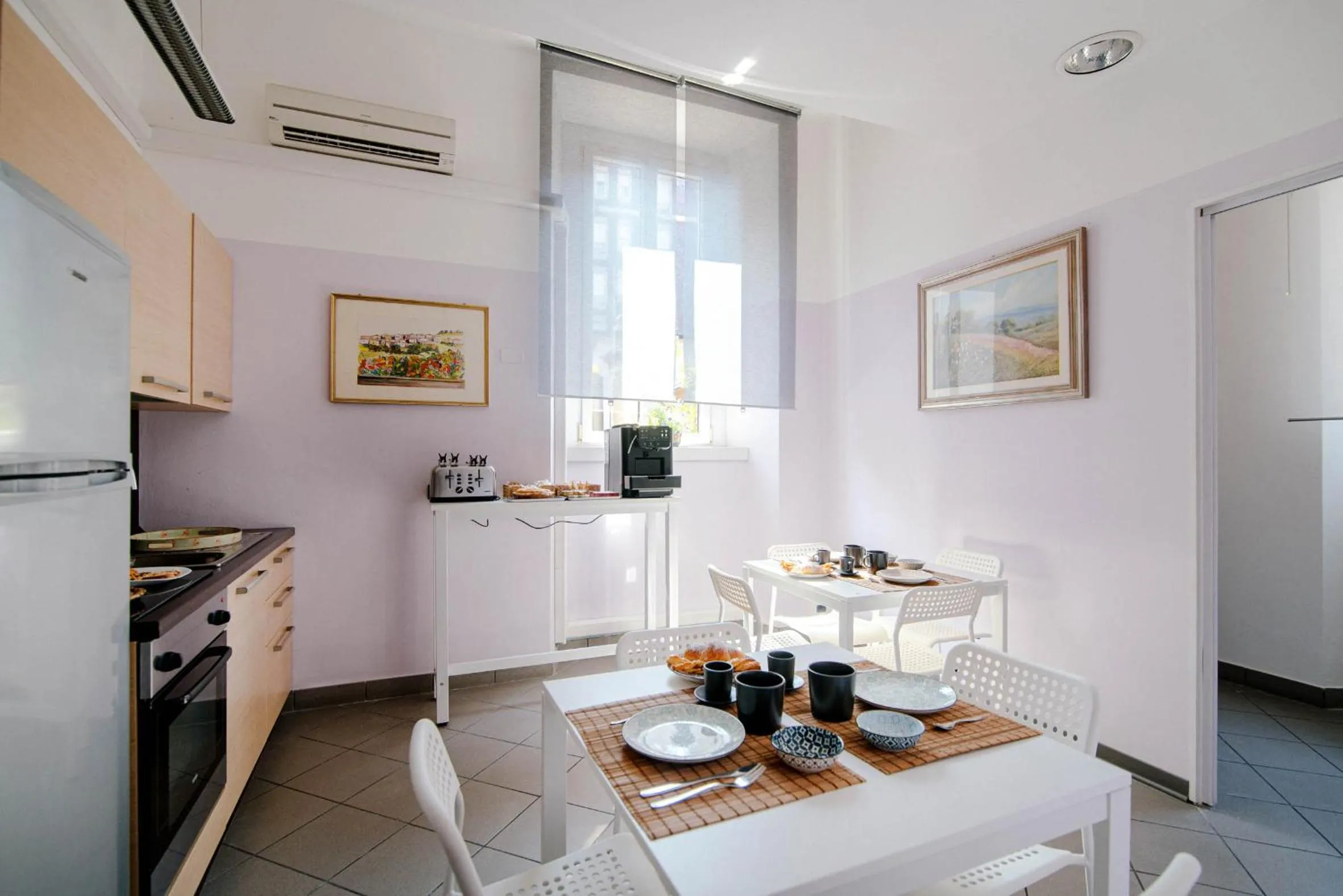 Communal kitchen in Downtown Rooms