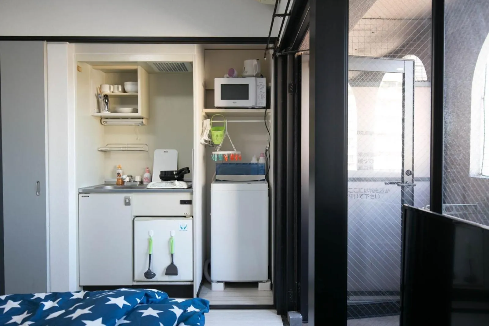 Kitchen or kitchenette in SUMIYOSHI APARTMENT Hotel 住吉アパートメントホテル