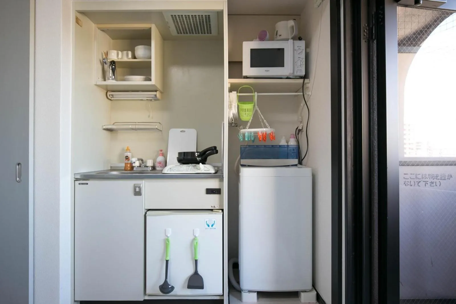 Kitchen or kitchenette in SUMIYOSHI APARTMENT Hotel 住吉アパートメントホテル