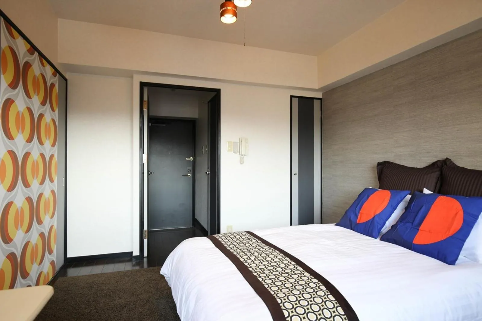 Bed in SUMIYOSHI APARTMENT Hotel 住吉アパートメントホテル