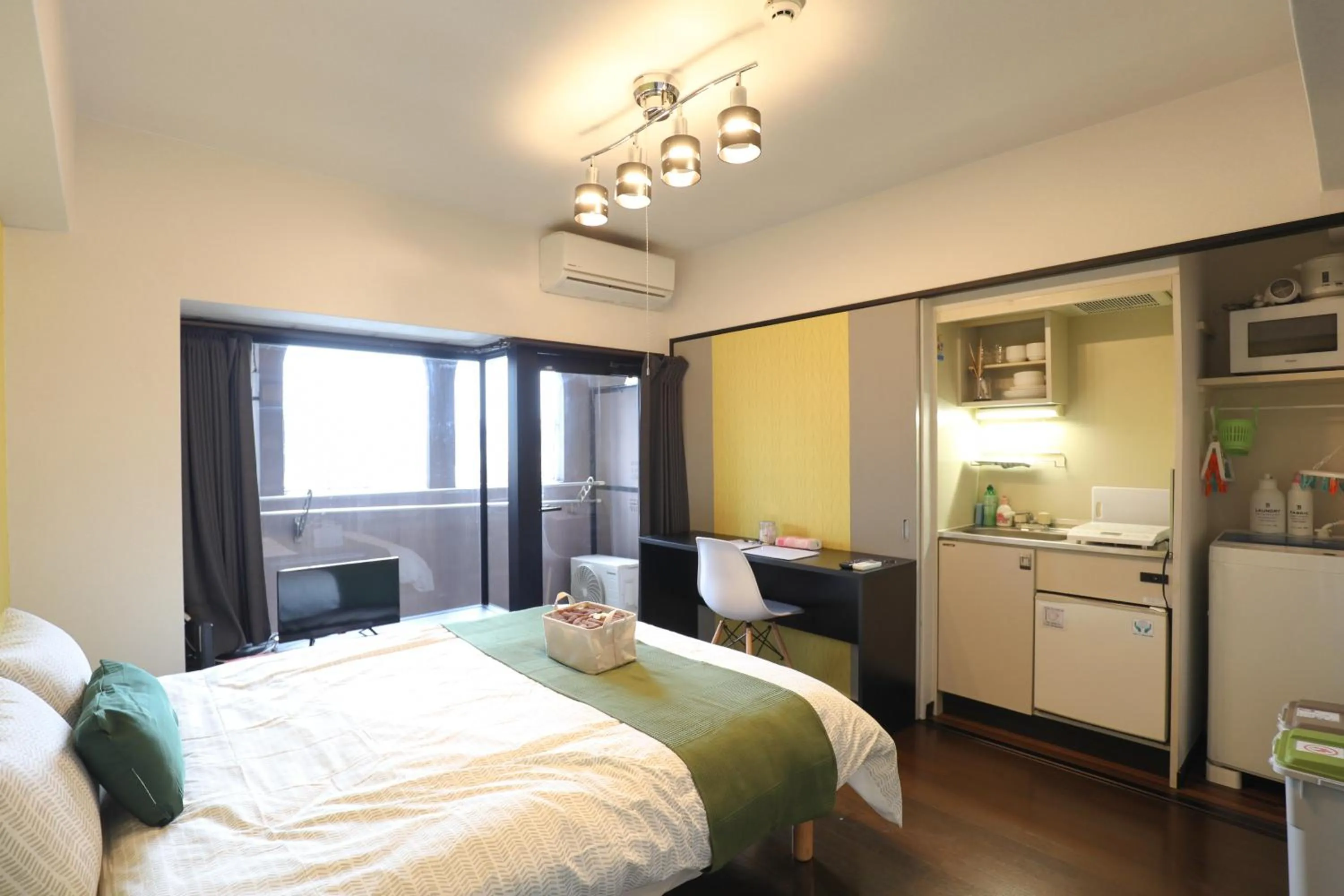 Bed in SUMIYOSHI APARTMENT Hotel 住吉アパートメントホテル