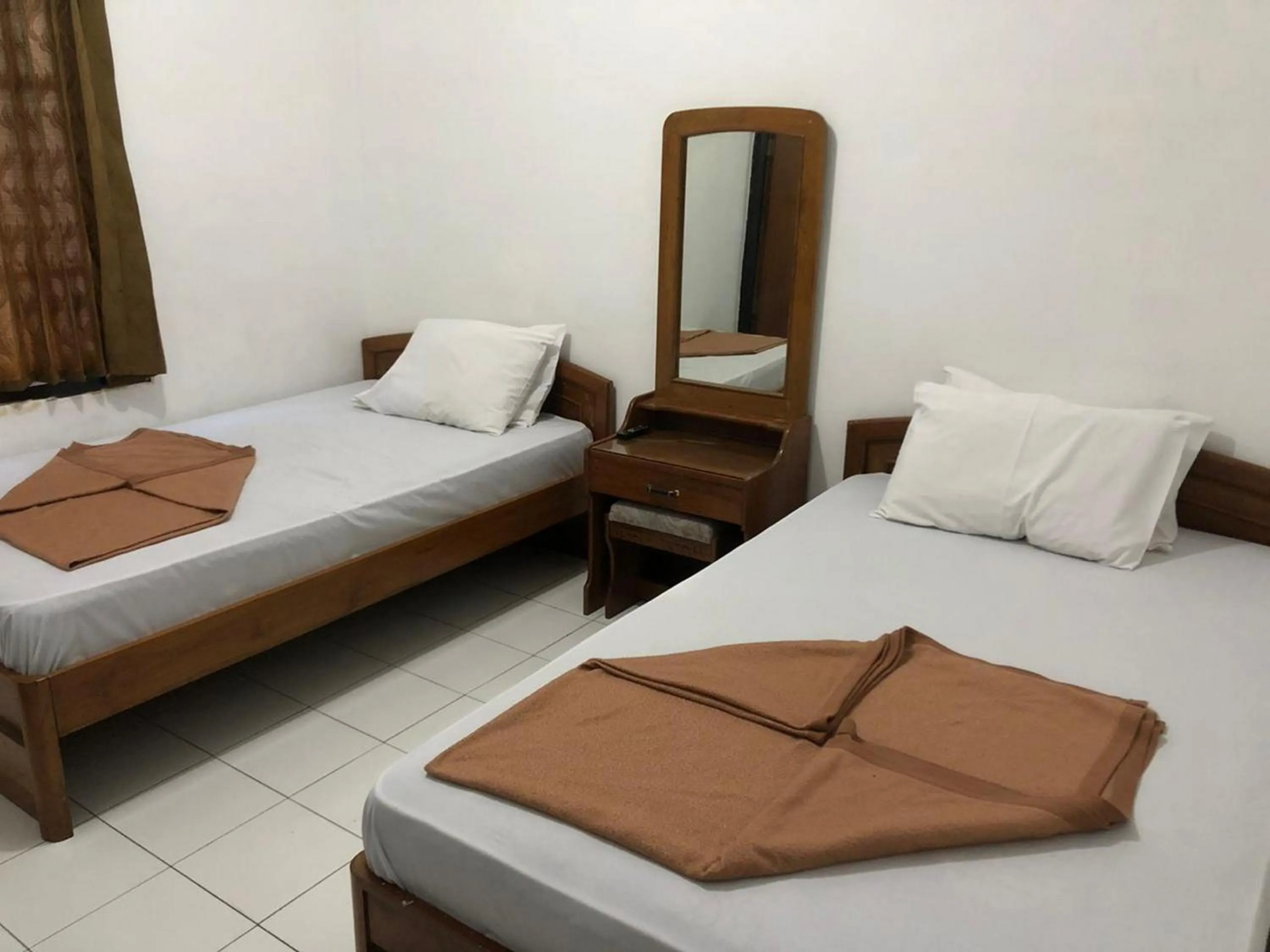 Bed in Hotel Baru Inn Batu RedPartner
