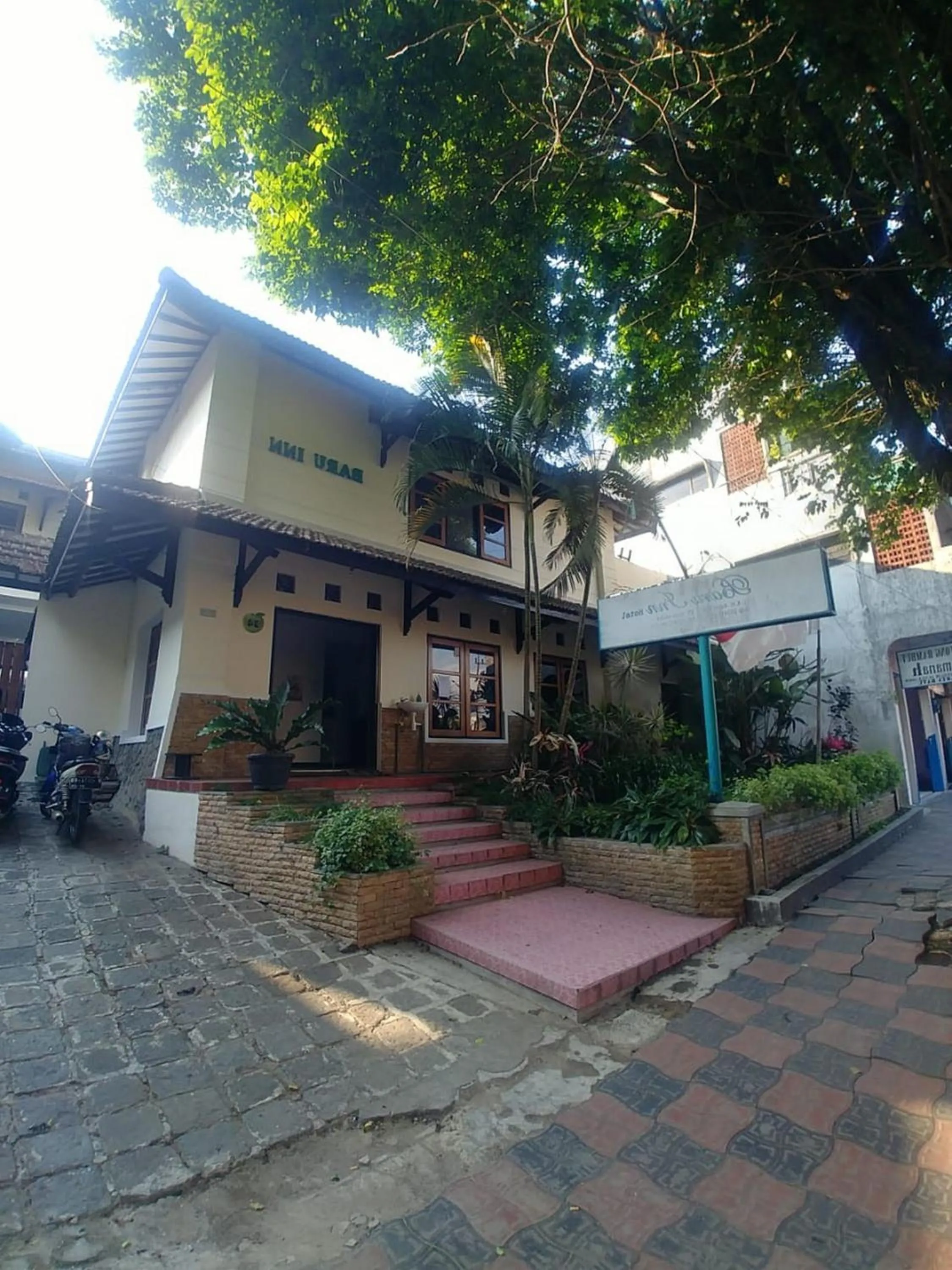 Property logo or sign in Hotel Baru Inn Batu RedPartner