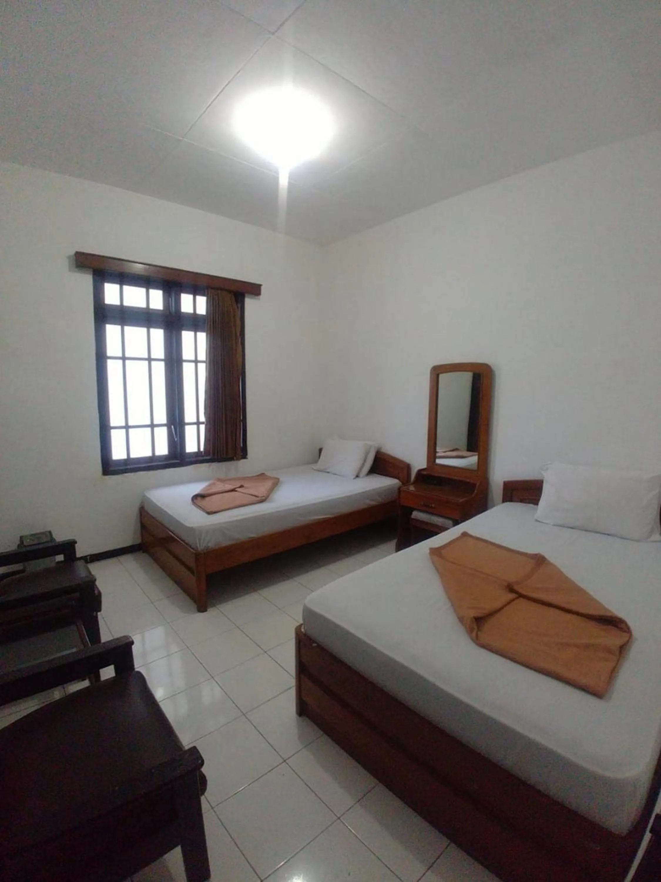 Bed in Hotel Baru Inn Batu RedPartner