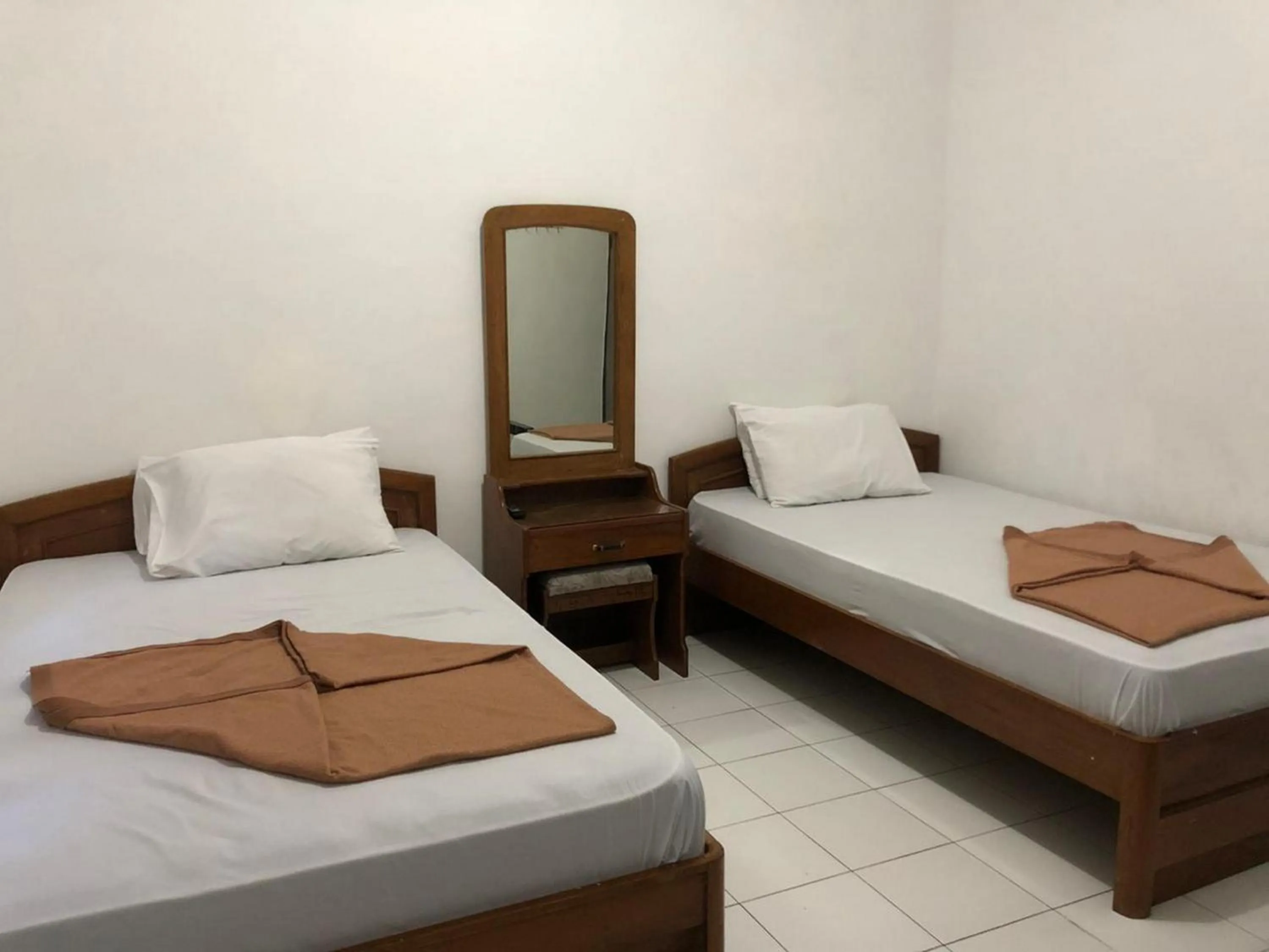 Bed in Hotel Baru Inn Batu RedPartner