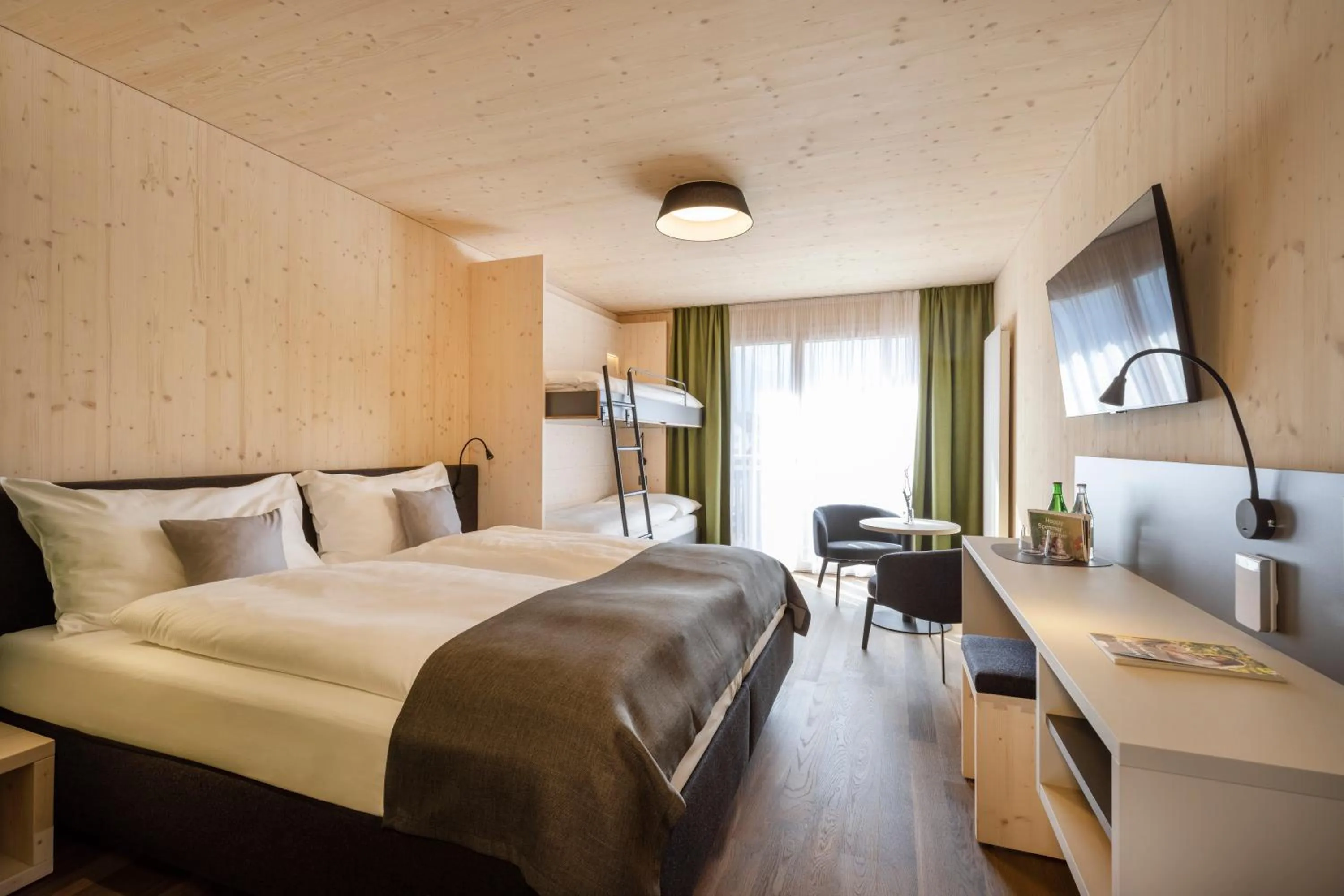 Photo of the whole room, Bed in AVES Hotel Savognin