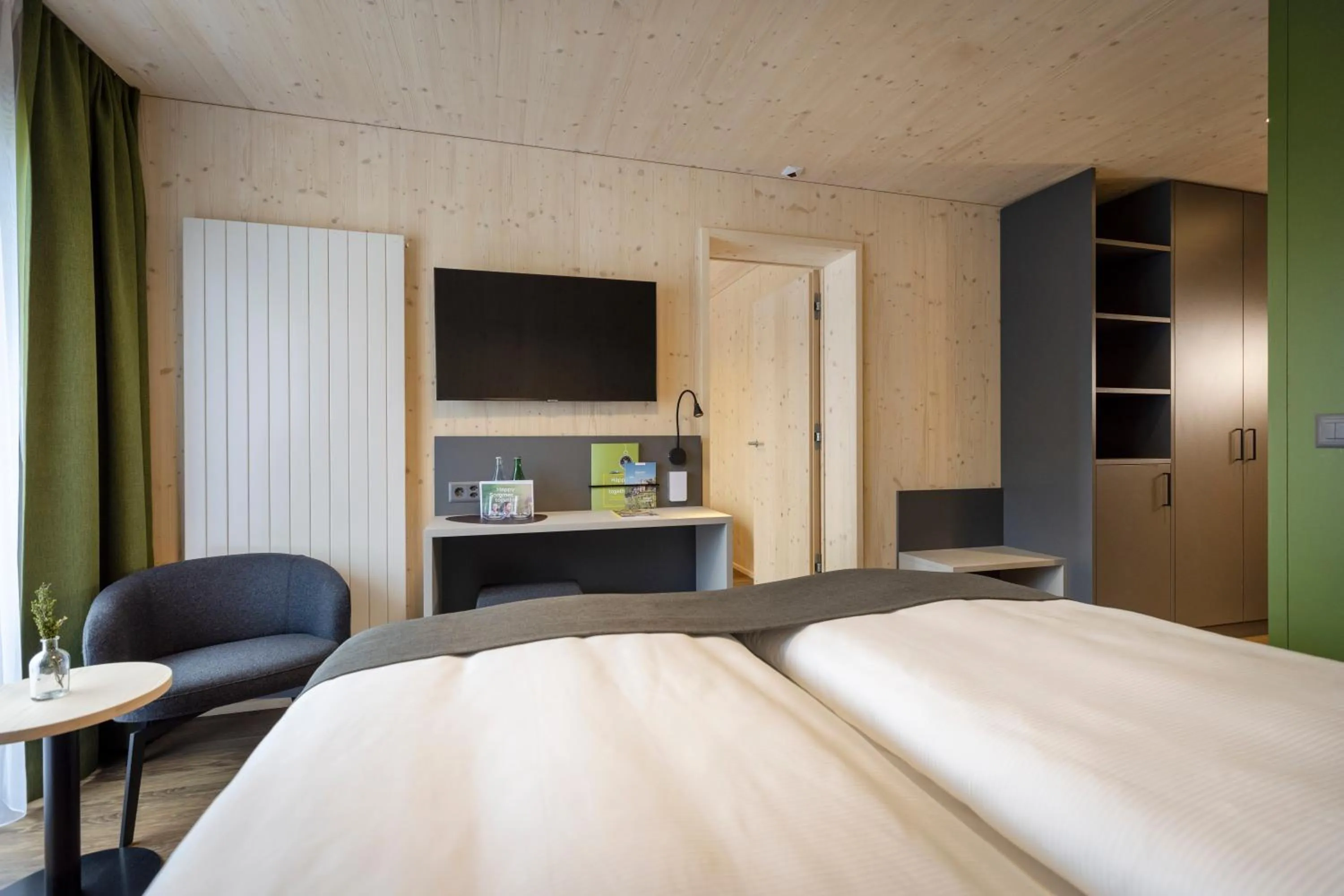 Photo of the whole room, Bed in AVES Hotel Savognin