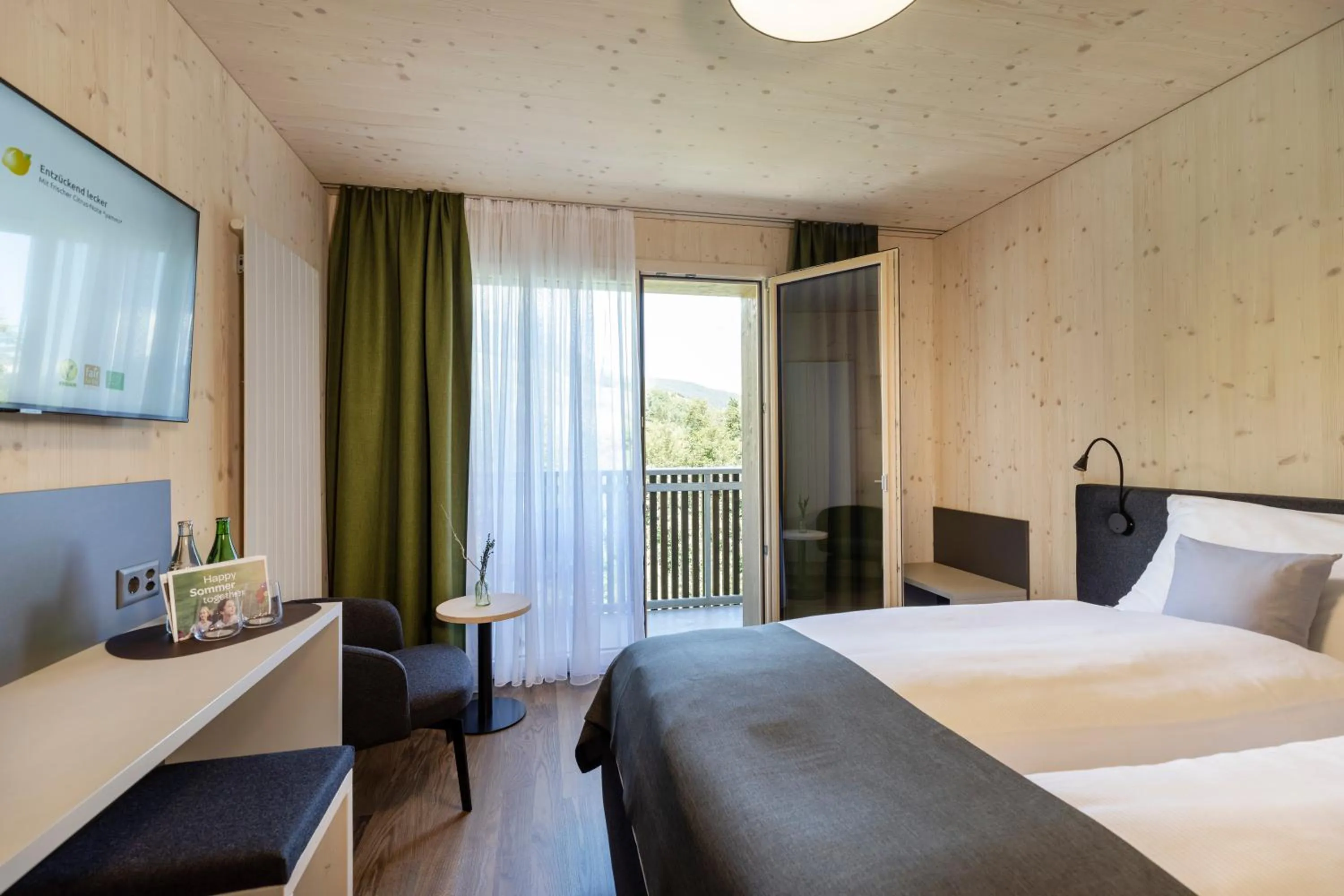 Photo of the whole room, Bed in AVES Hotel Savognin