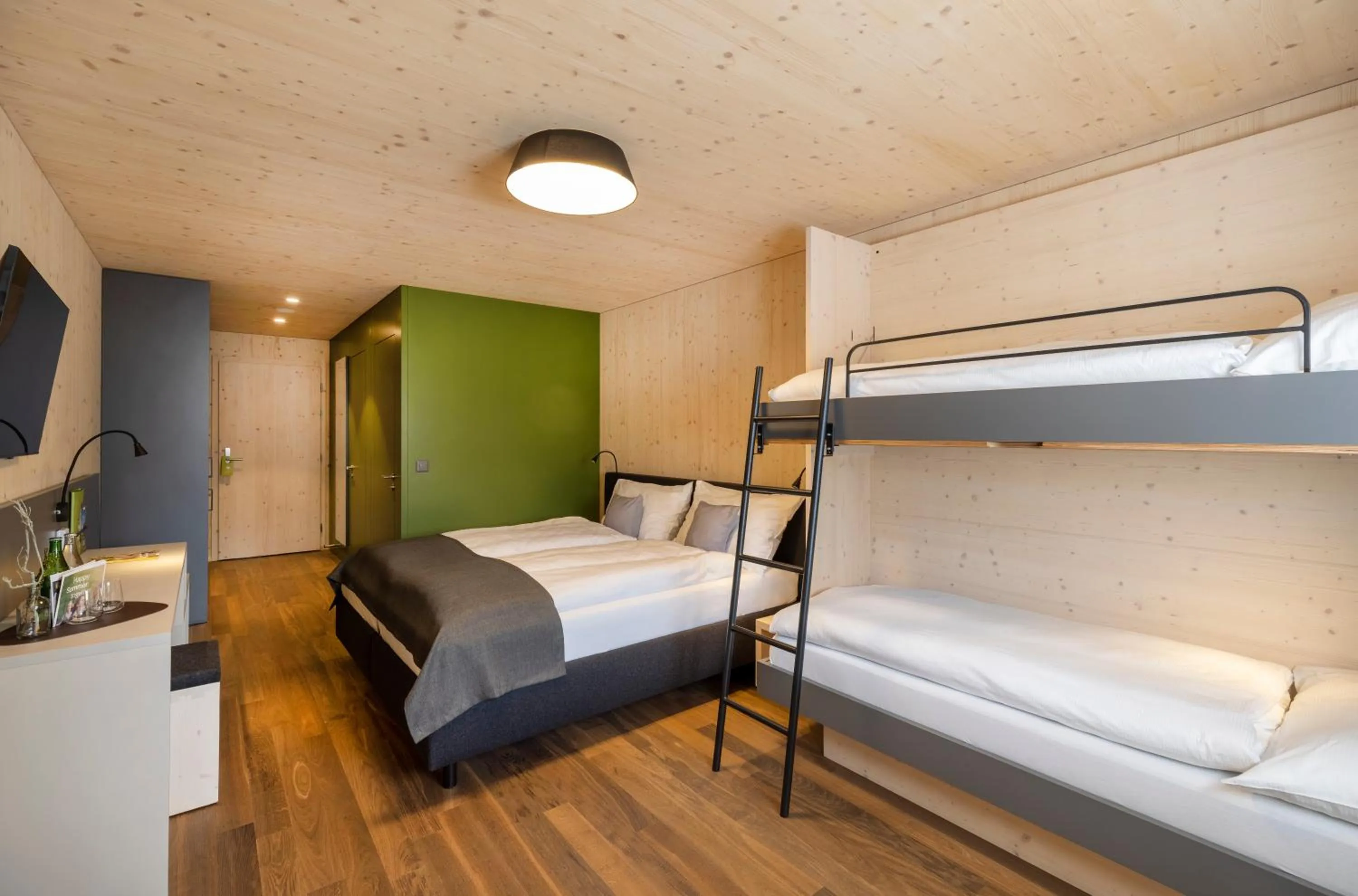 Photo of the whole room, Bed in AVES Hotel Savognin