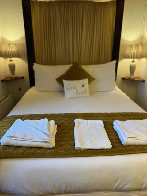 Bed in Parlors Hall Hotel
