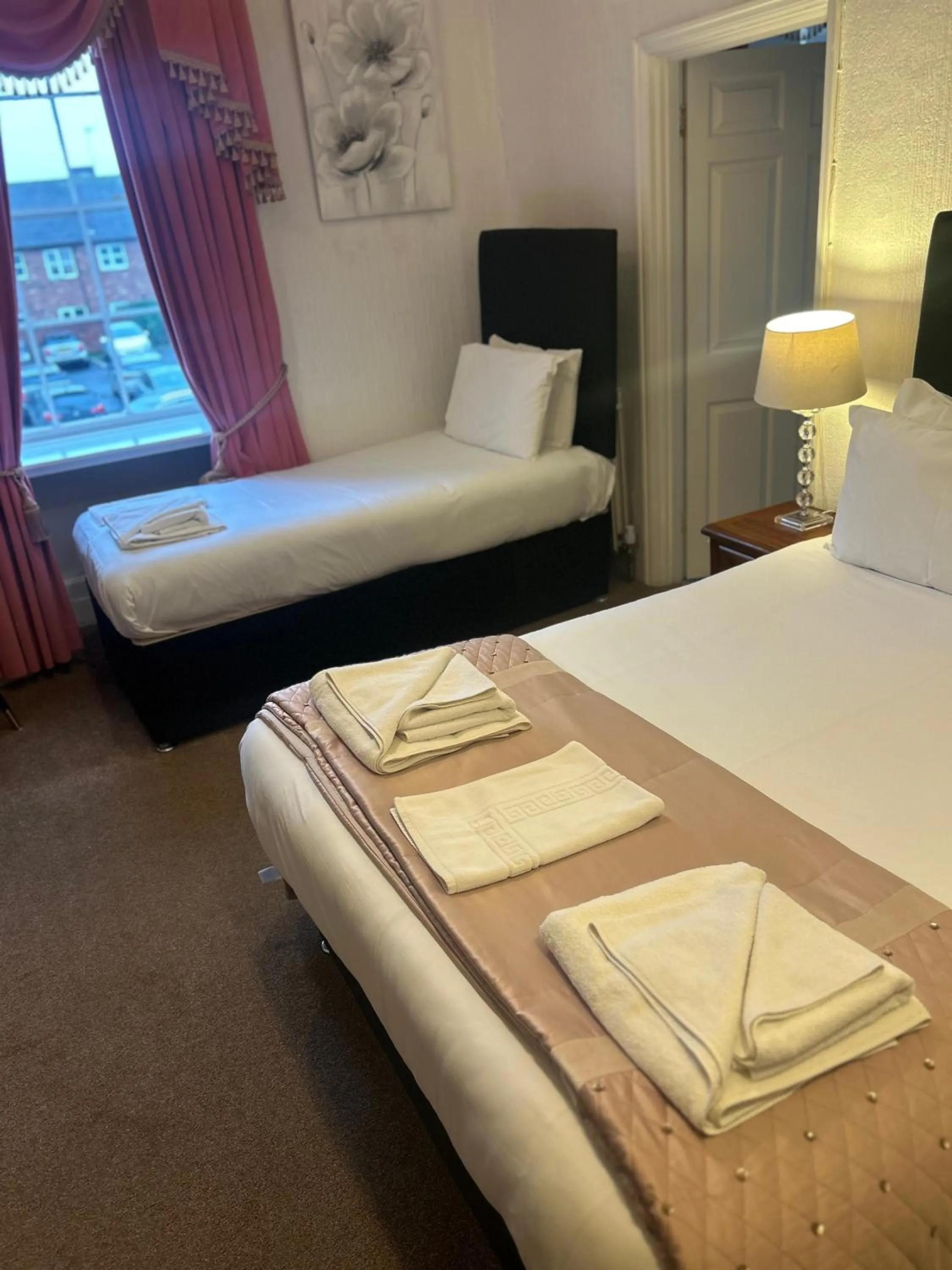 Bed in Parlors Hall Hotel