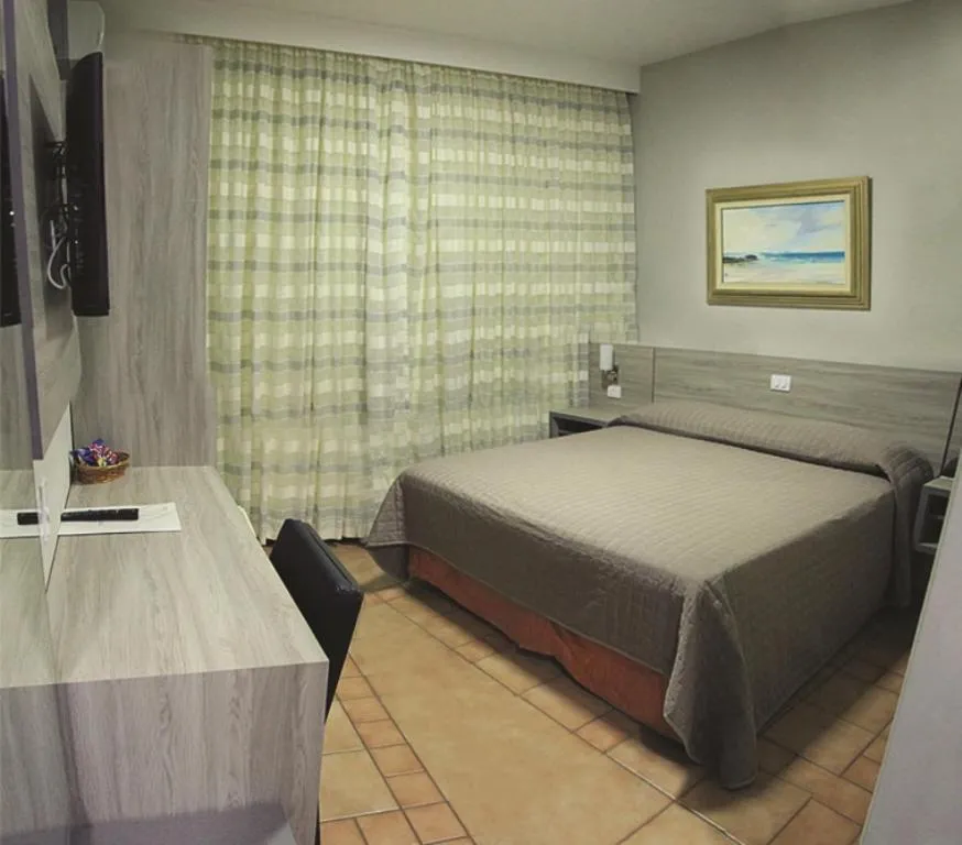 Bed in PARANÁ PALACE HOTEL