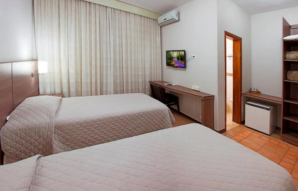Bed in PARANÁ PALACE HOTEL
