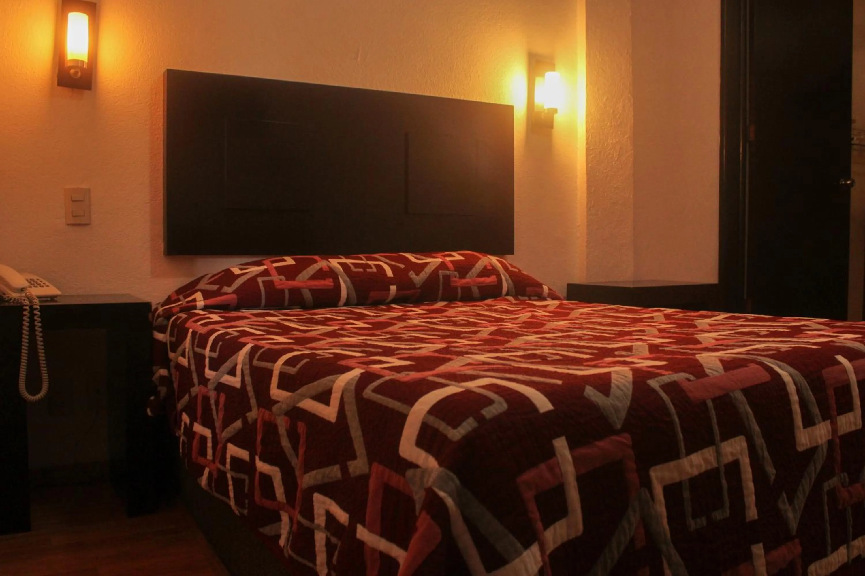 Bed in Hotel Alika