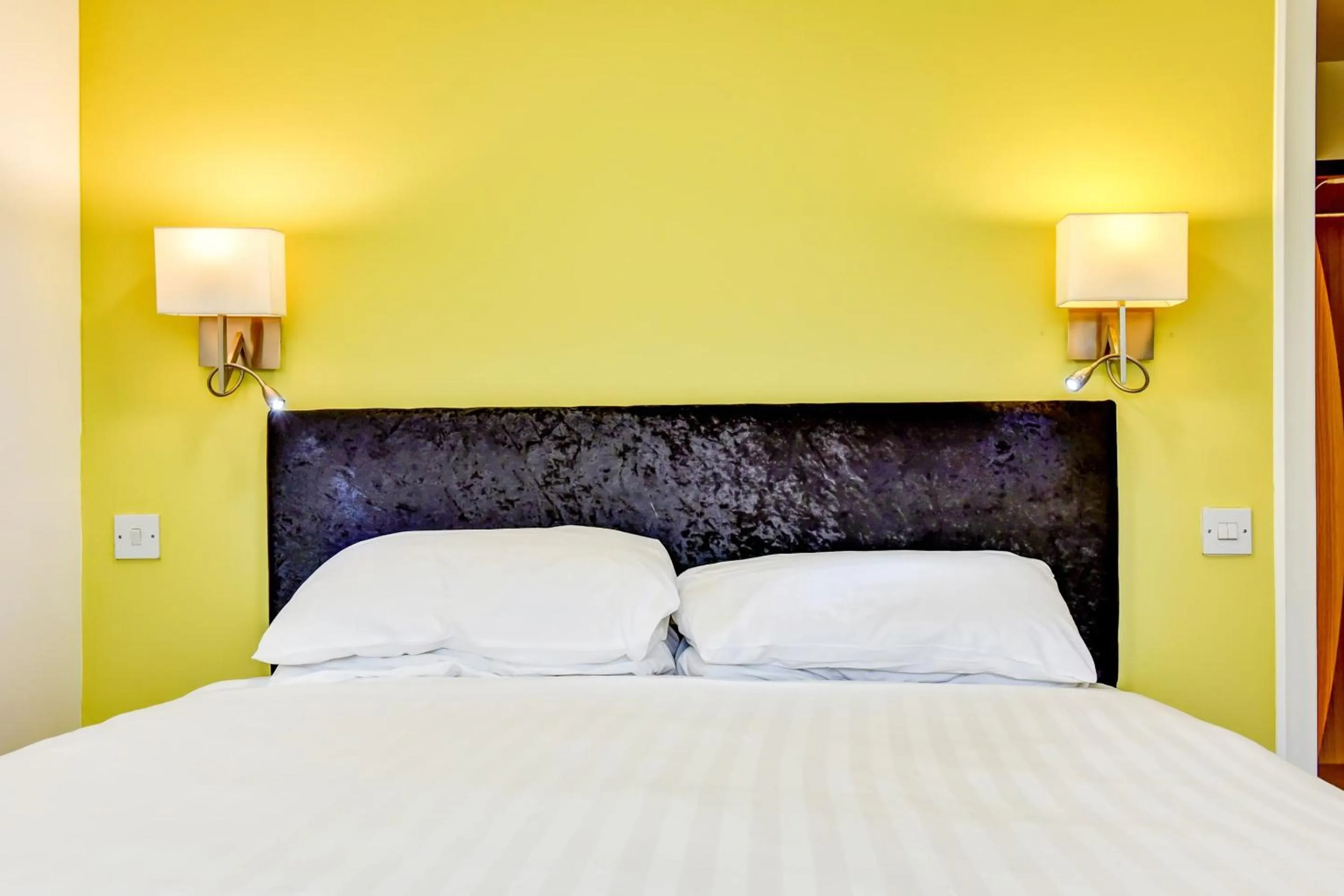 Bedroom in The Hotel Rafiya, Redditch