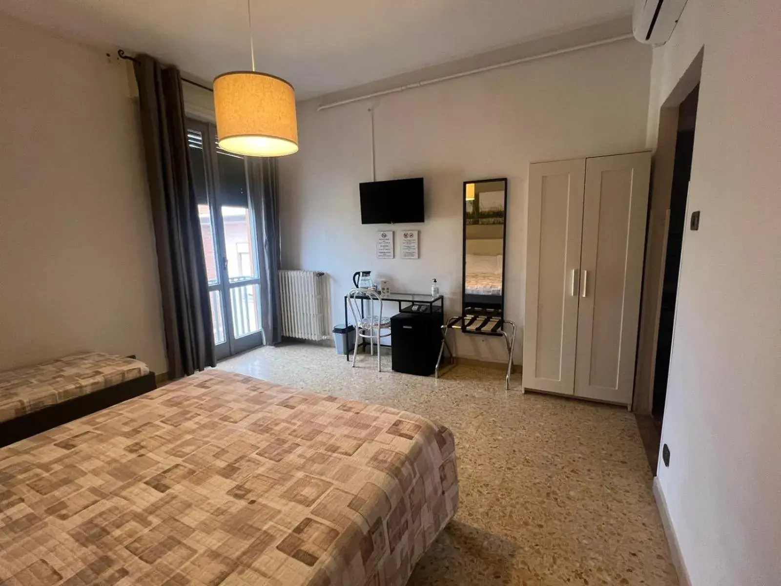 Triple Room with Private Bathroom in Vacanze Pisane Triple Room with Private Bathroom in Vacanze Pisane