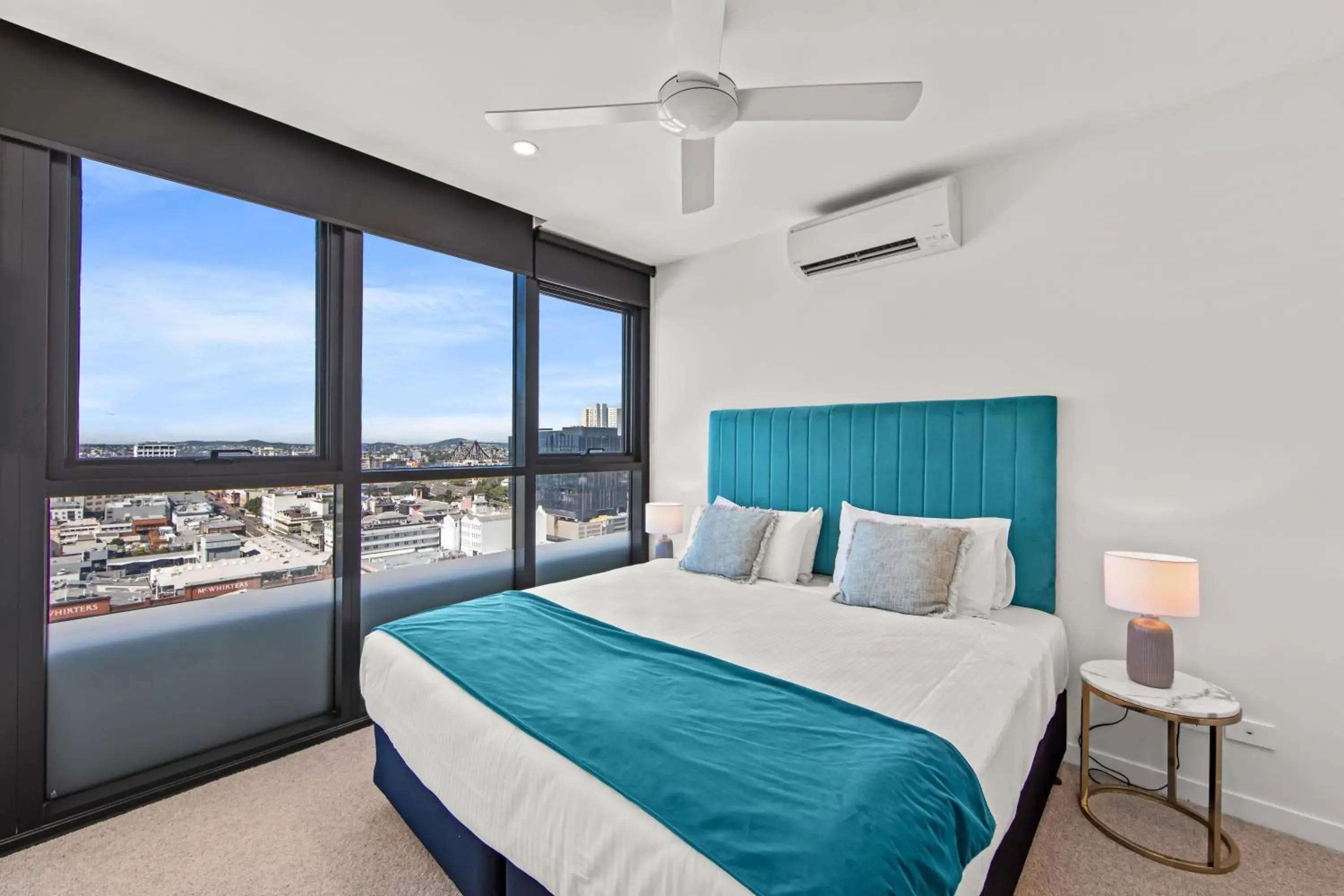 Bed in Fortitude Valley Apartments by CLLIX Bed in Fortitude Valley Apartments by CLLIX