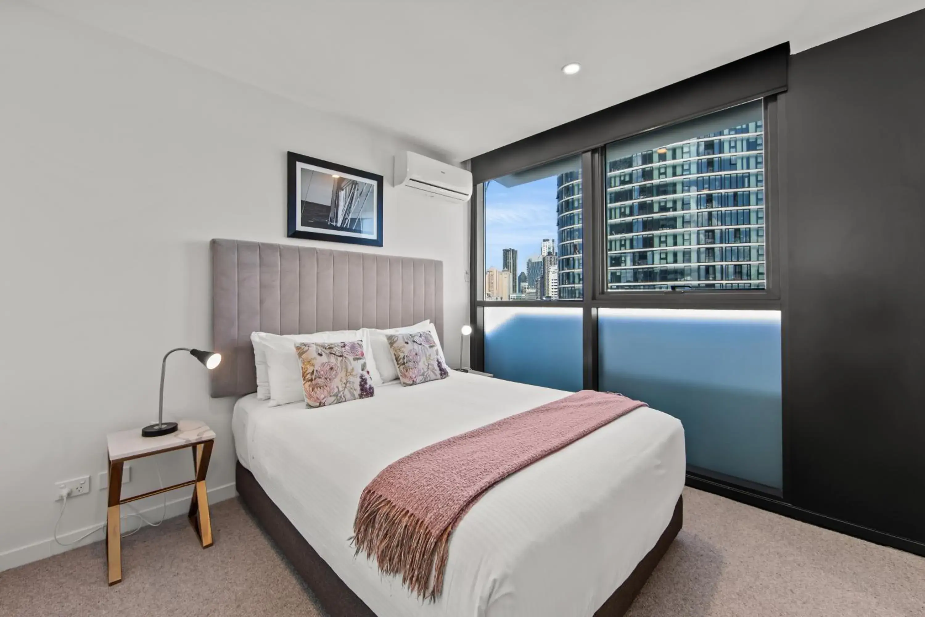 Bed in Fortitude Valley Apartments by CLLIX Bed in Fortitude Valley Apartments by CLLIX