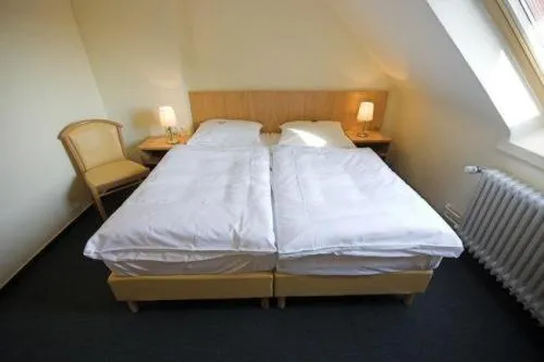 Bed in Hotel Wiking