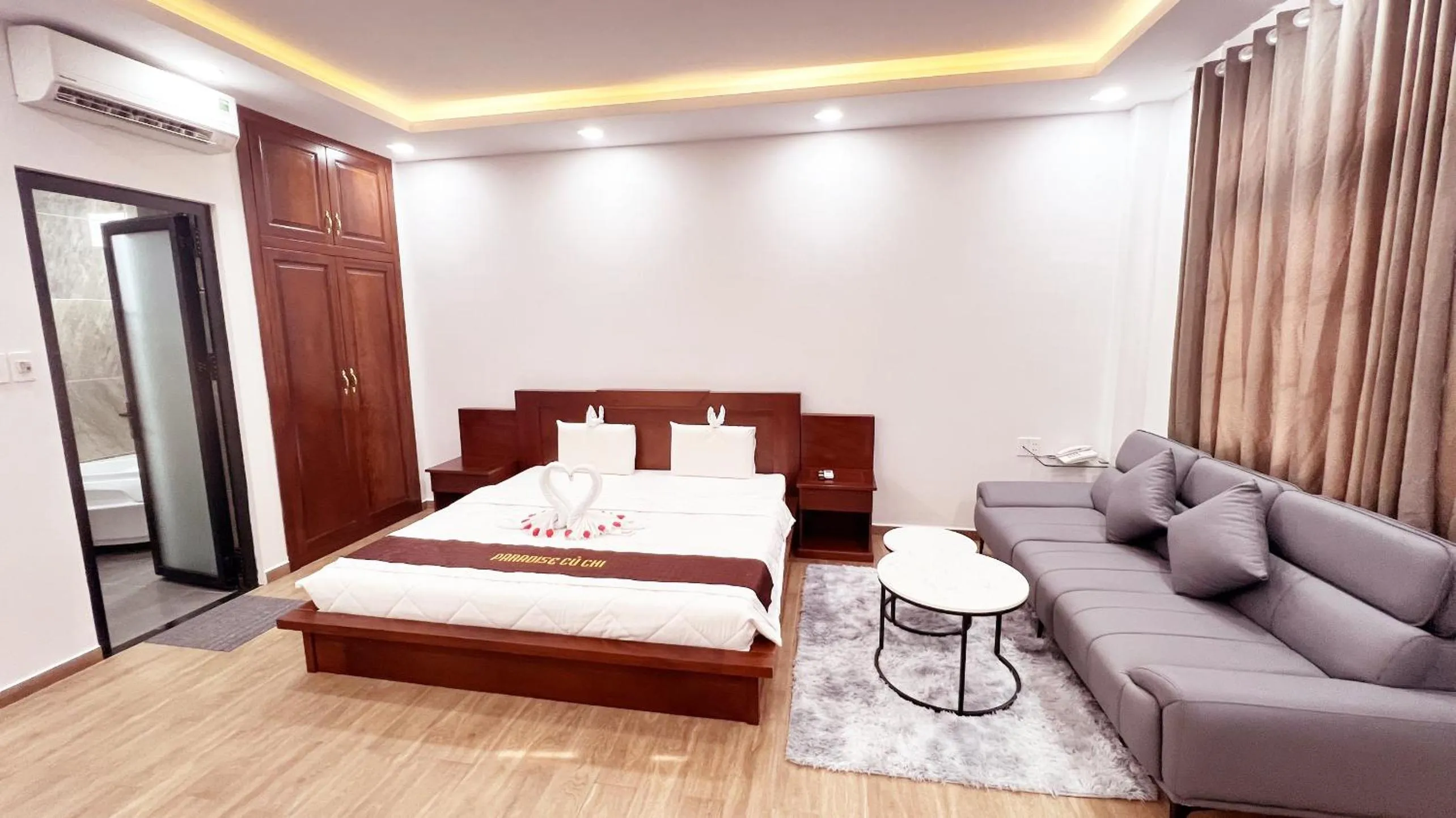 Seating area, Bed in Paradise Cu Chi Hotel