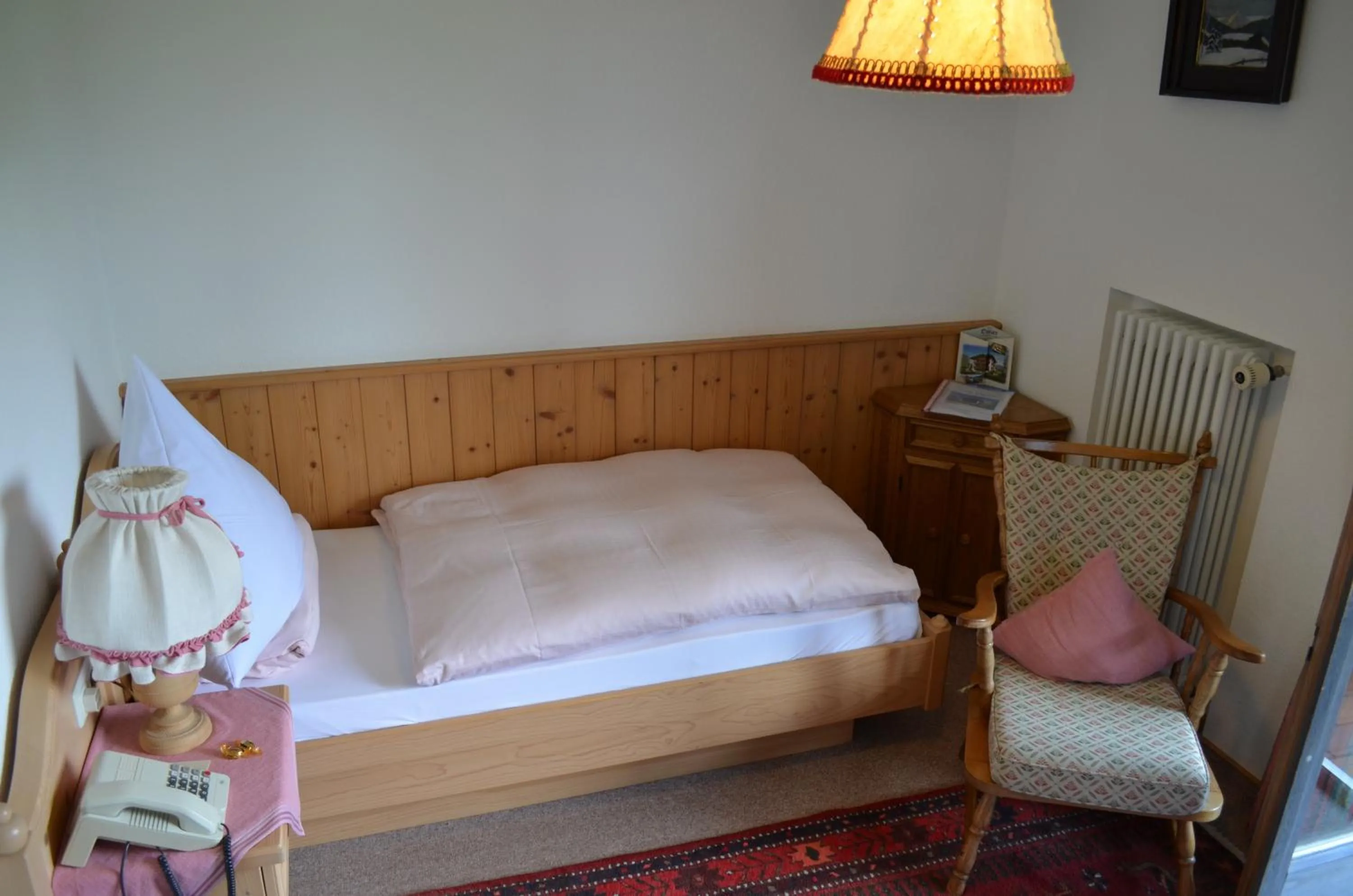 Bed in Hotel-Pension-Ostler