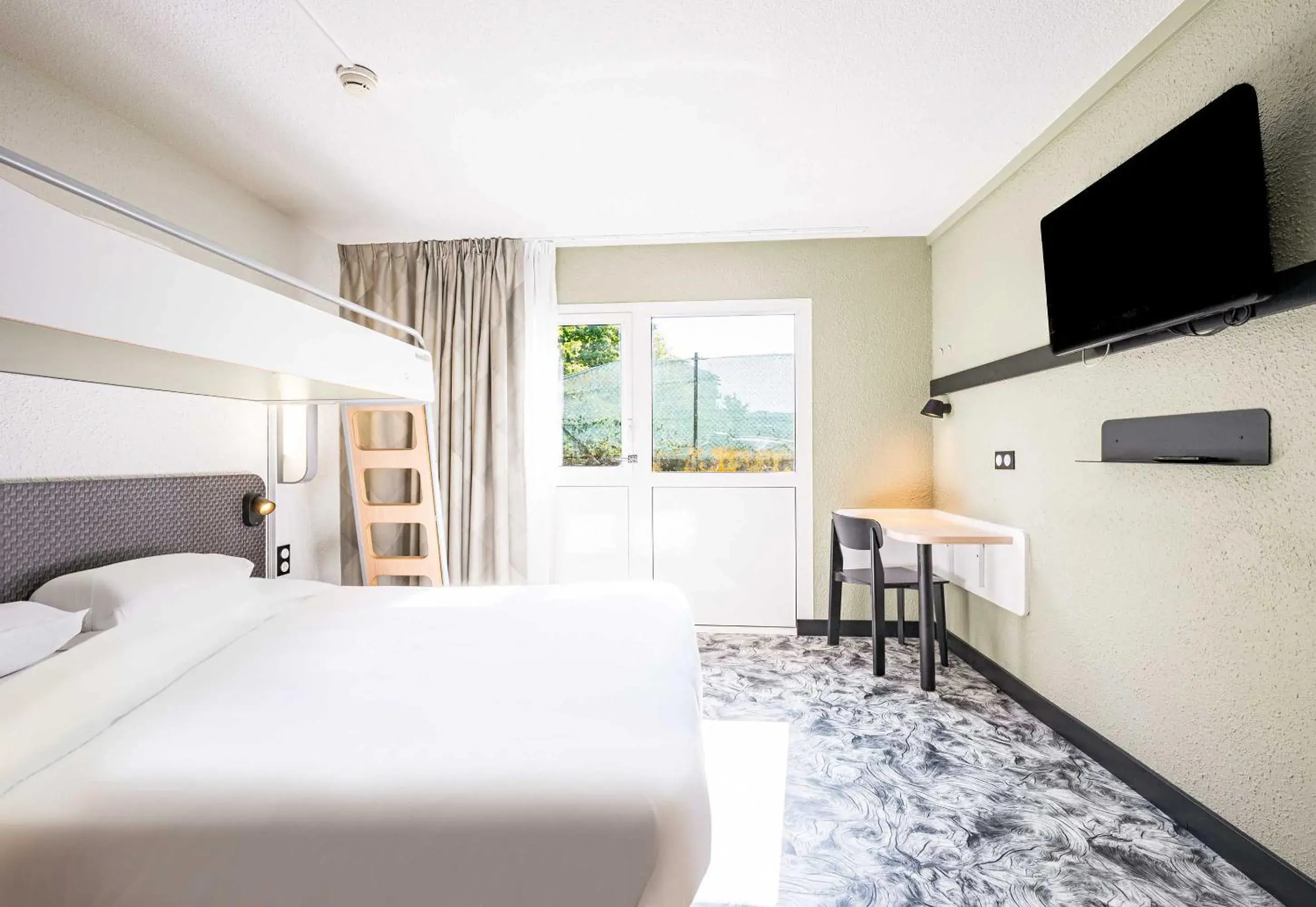 Photo of the whole room, Bed in B&B HOTEL Annemasse Est Photo of the whole room, Bed in B&B HOTEL Annemasse Est