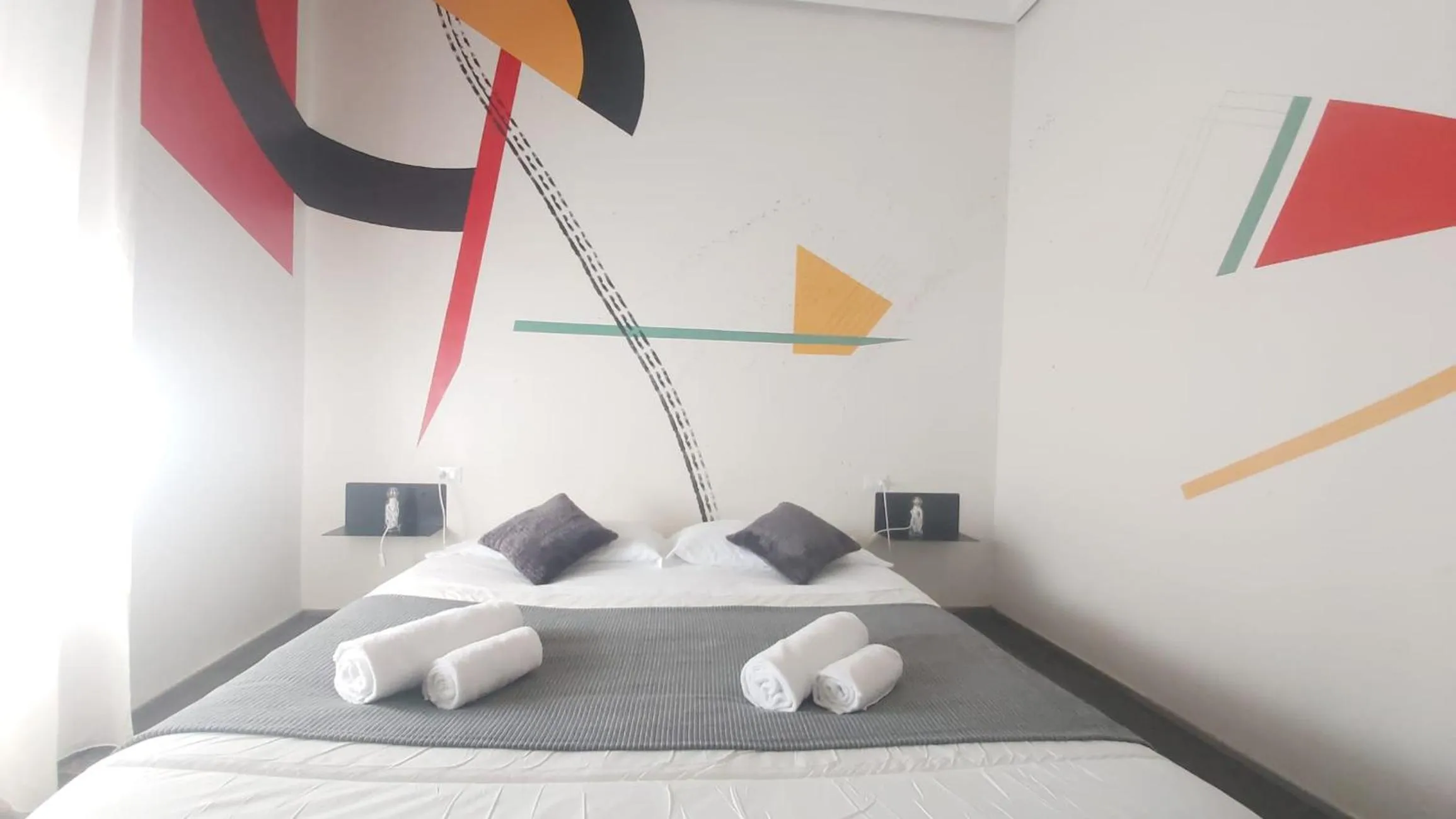 Bed in Street Art Inn Florence