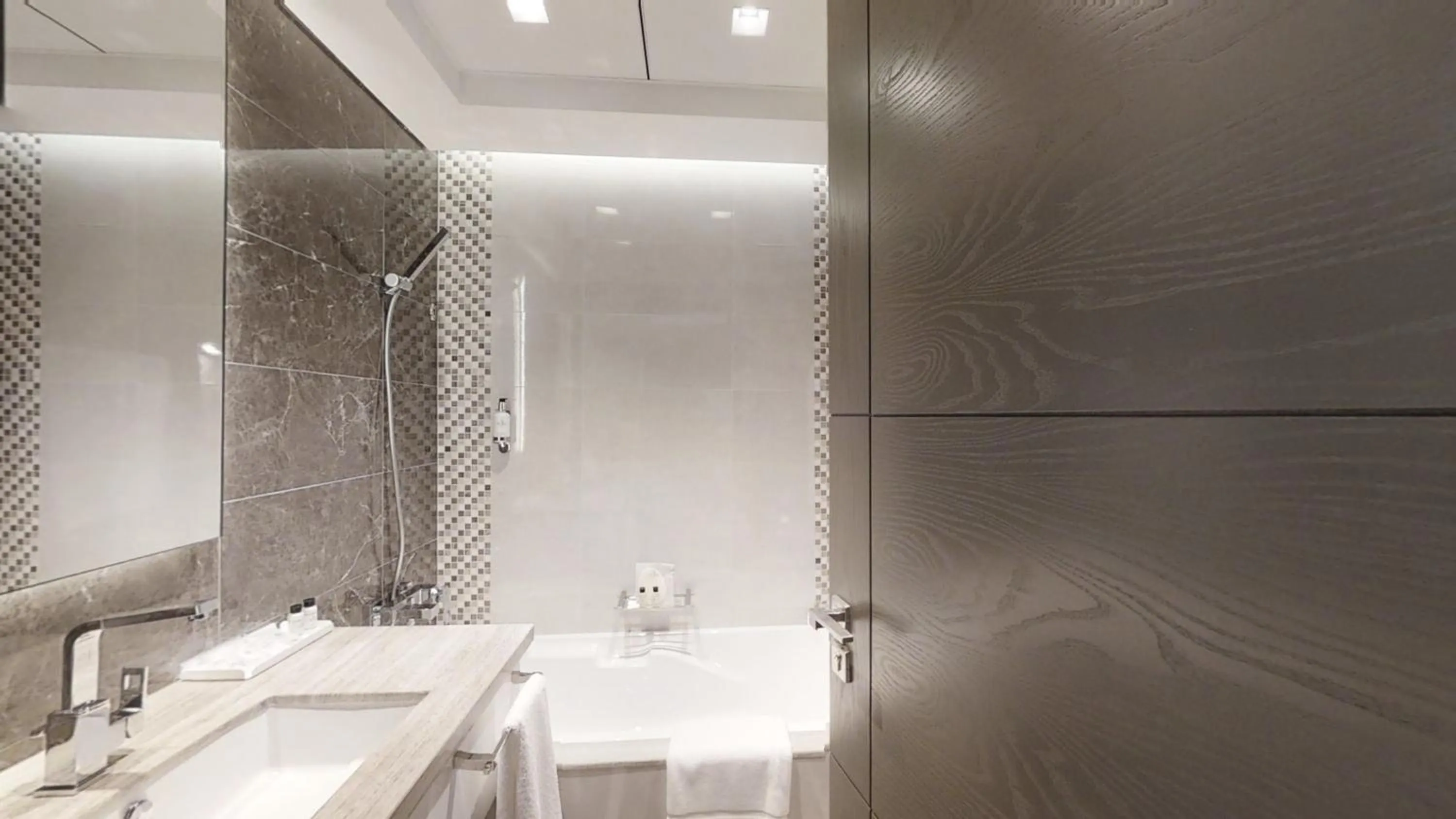 Bathroom in SUHA Mina Rashid Hotel Apartments