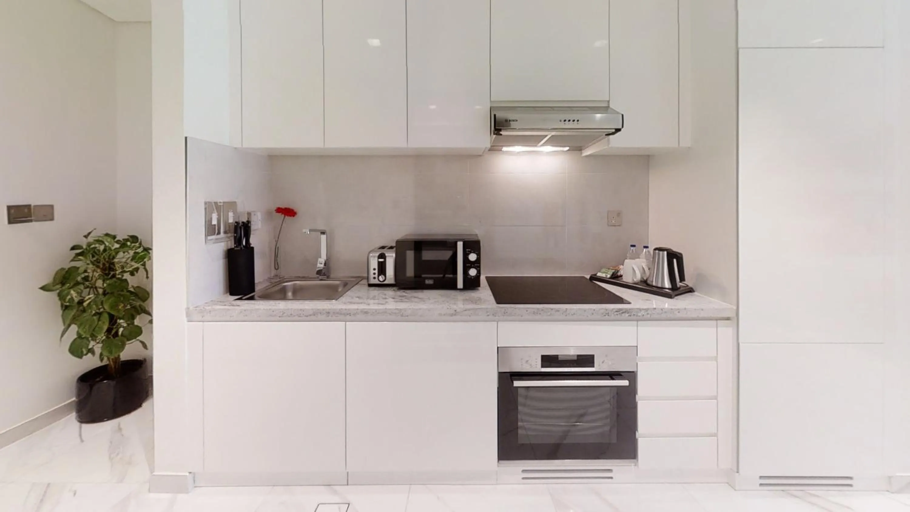 Kitchen or kitchenette in SUHA Mina Rashid Hotel Apartments