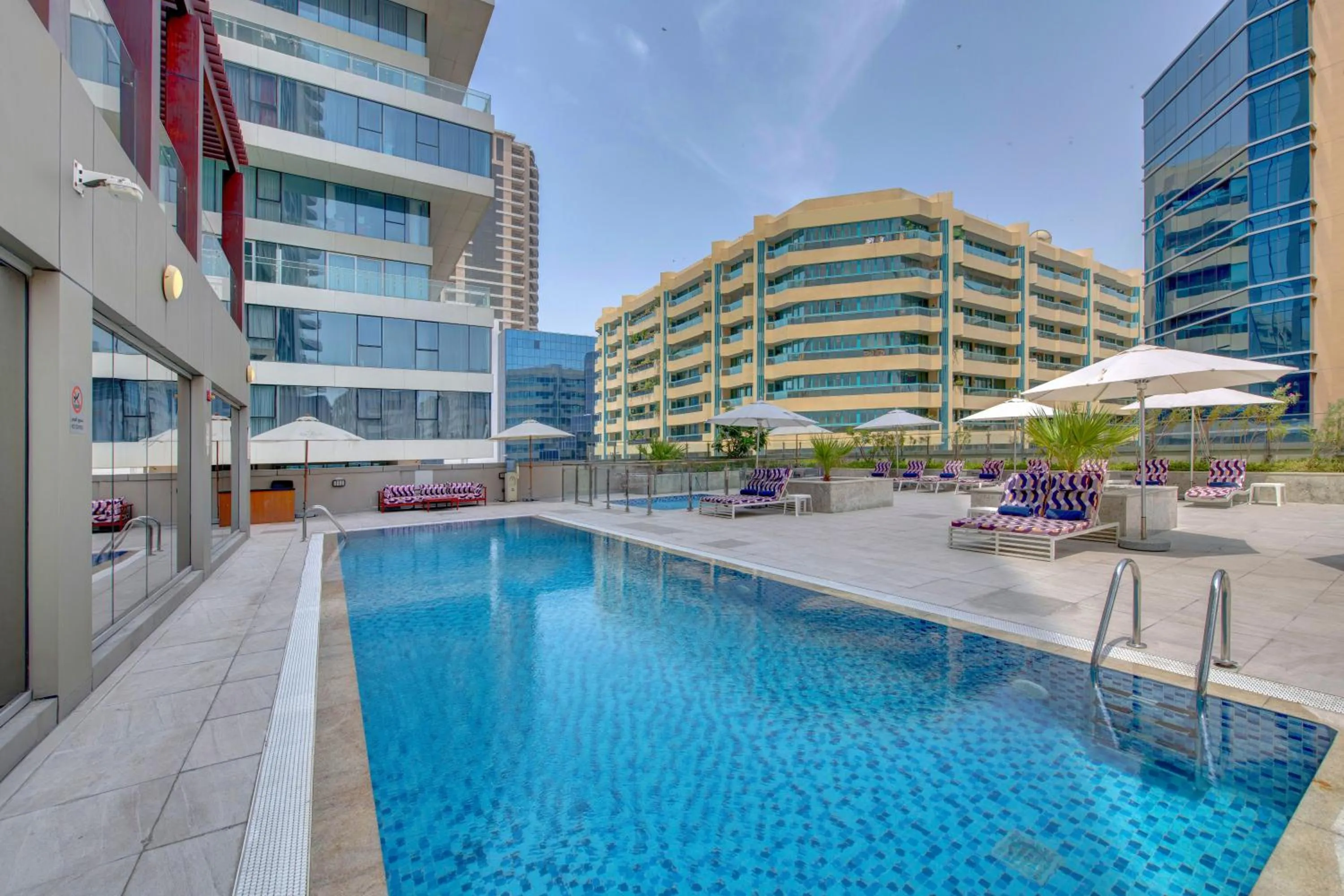 Swimming pool in SUHA Mina Rashid Hotel Apartments